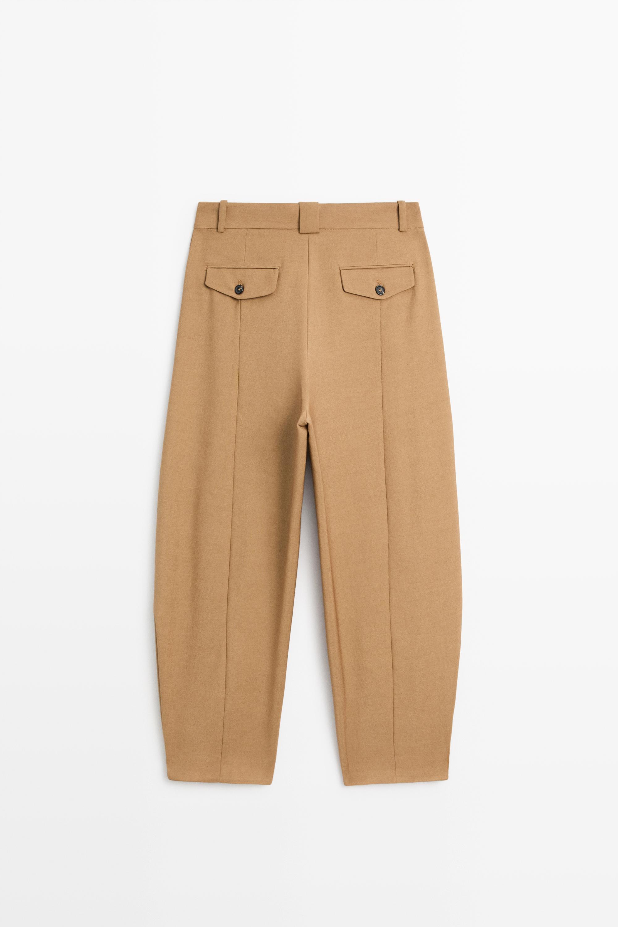 Pantalon en laine à détails plissés