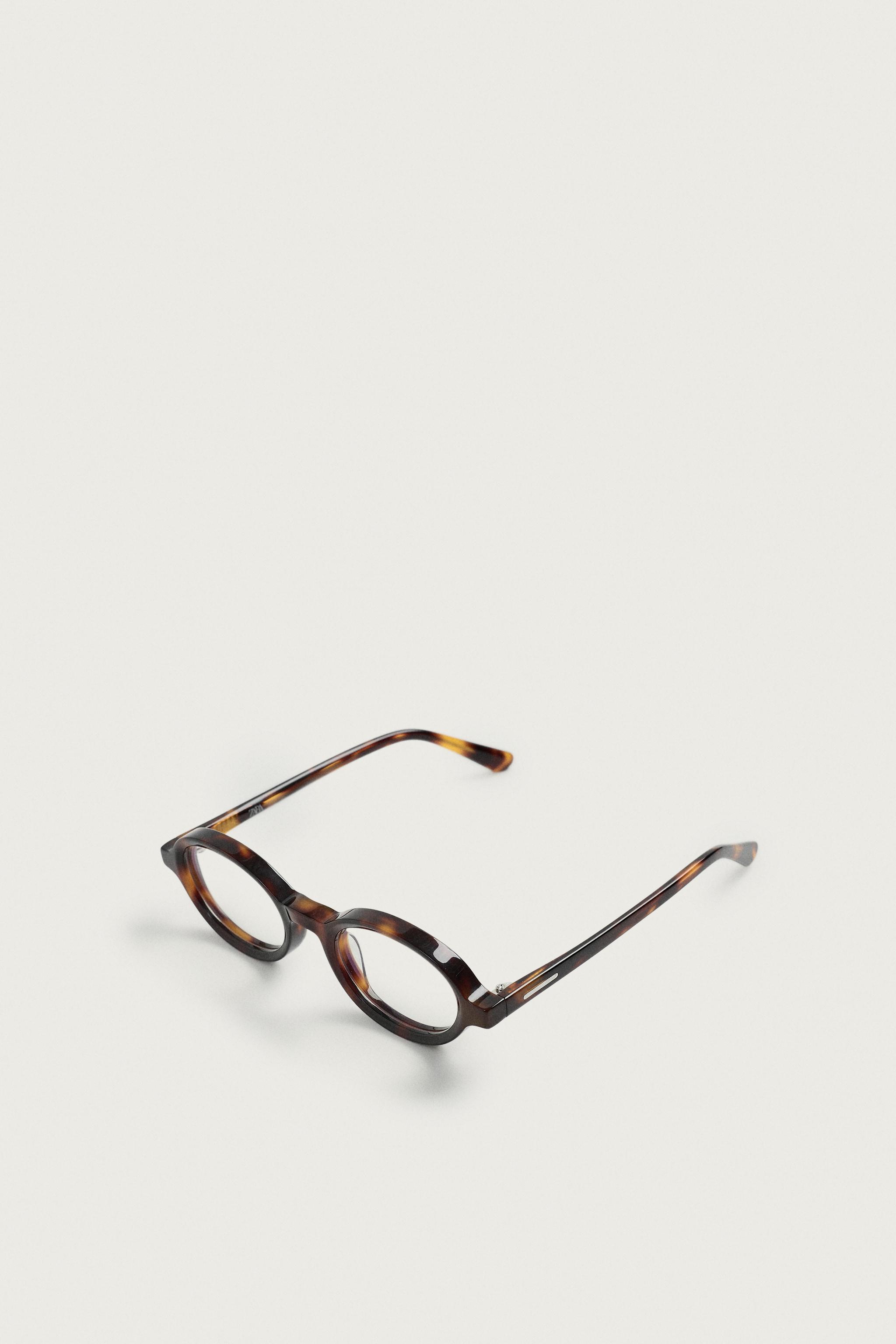 TORTOISESHELL EFFECT OVAL SUNGLASSES