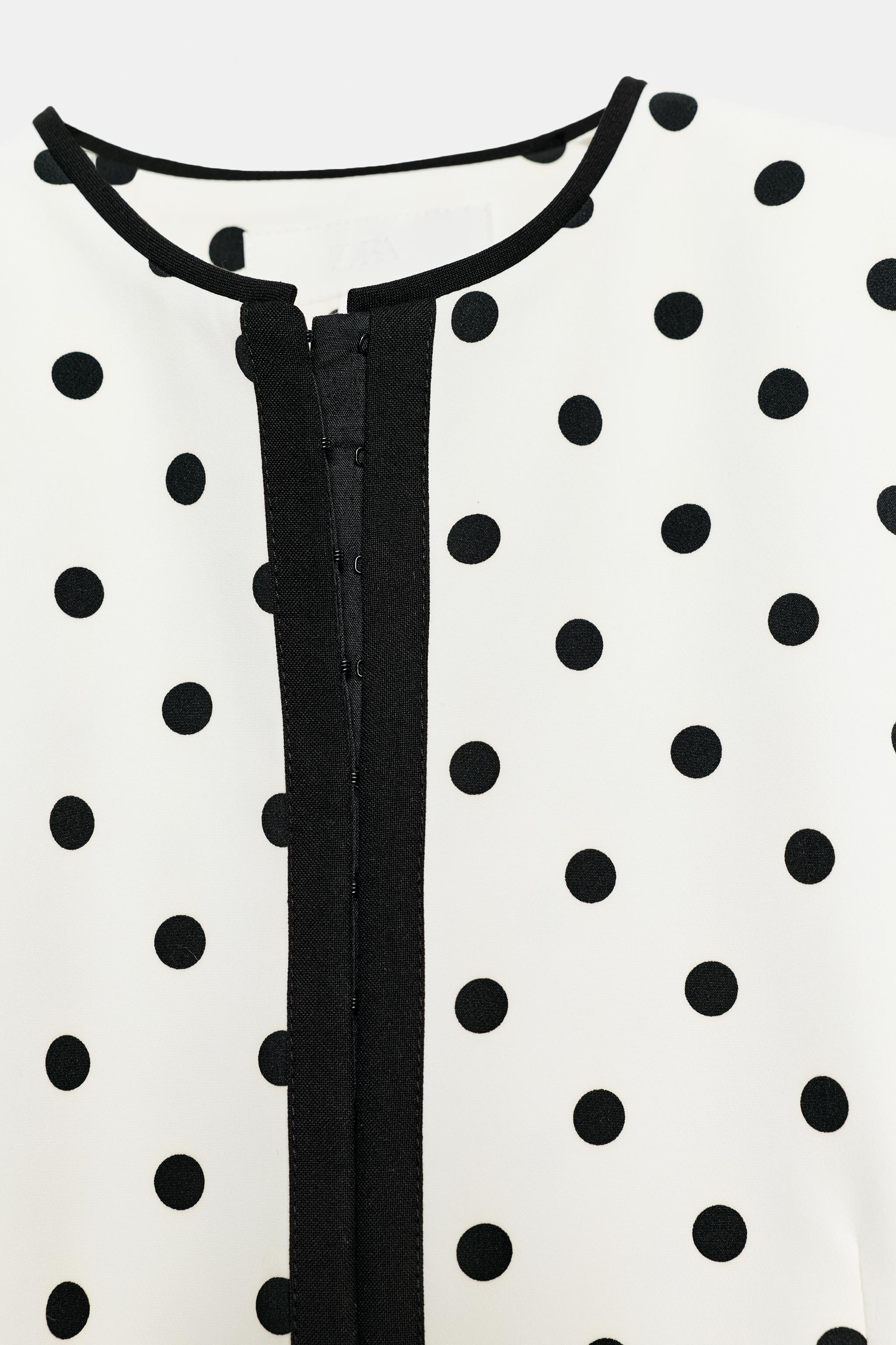 VESTE COURTE À POIS