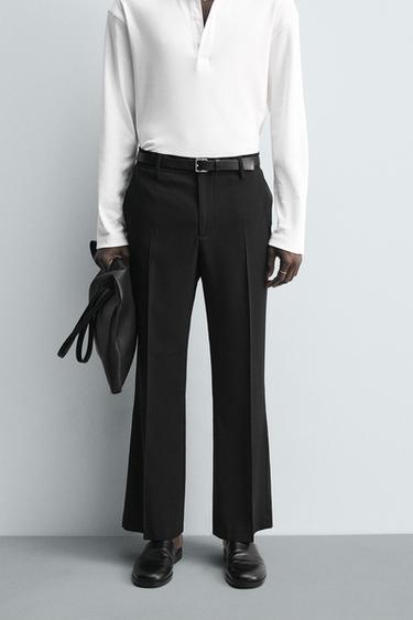 LOOSE-FITTING FLARED TROUSERS - Black by Zara - Image 1