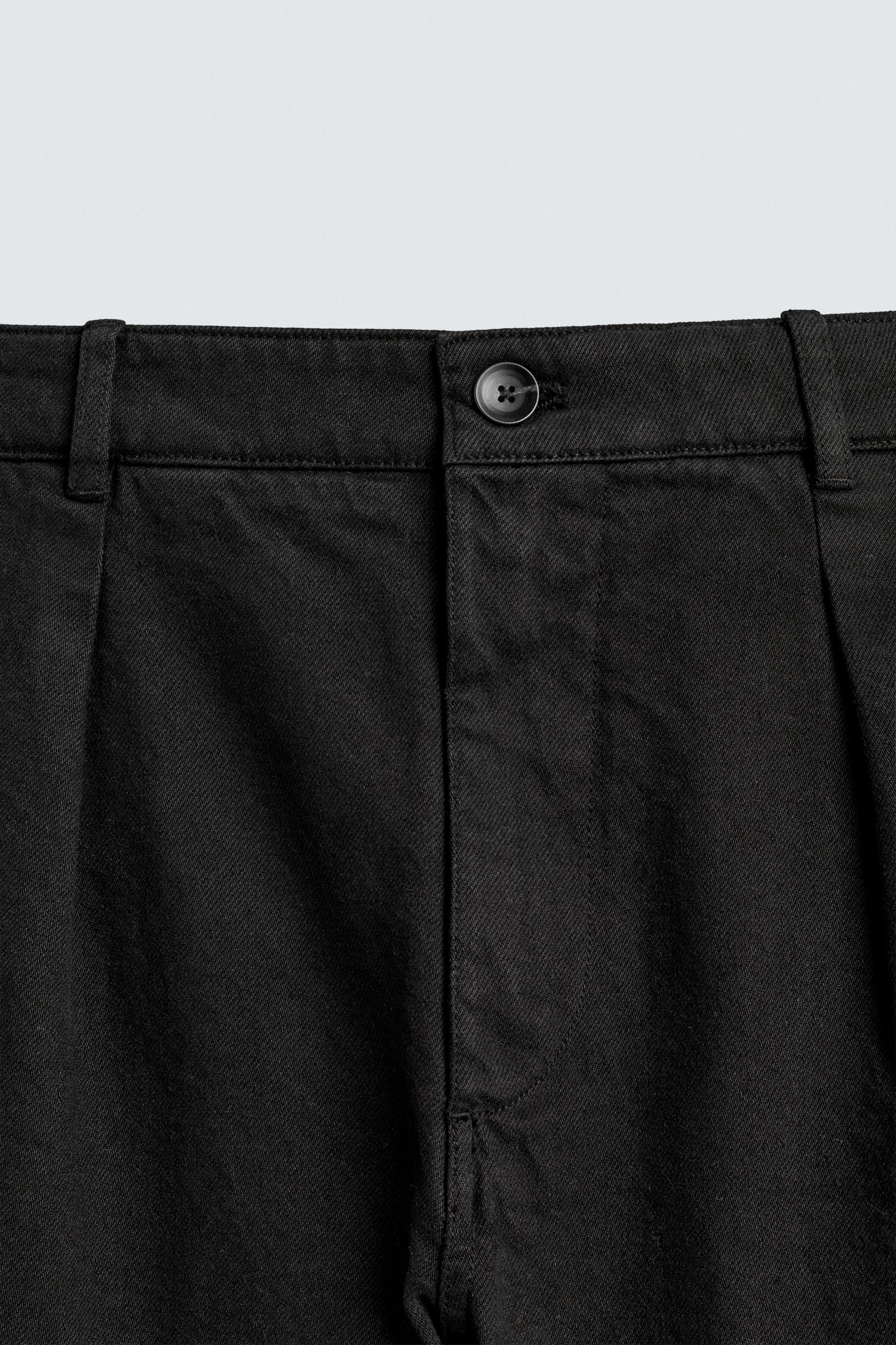 PLEATED RELAXED FIT PANTS