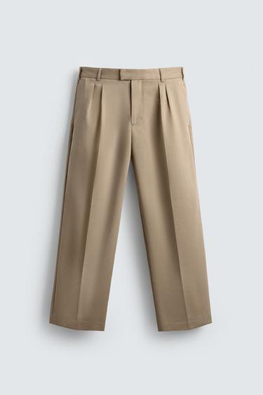 RELAXED FIT PLEATED TROUSERS - Beige by Zara