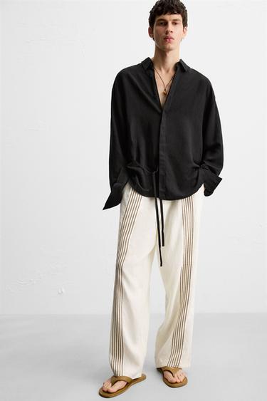 PANTALÓN 100% LINO BORDADOS - Blanco roto de Zara