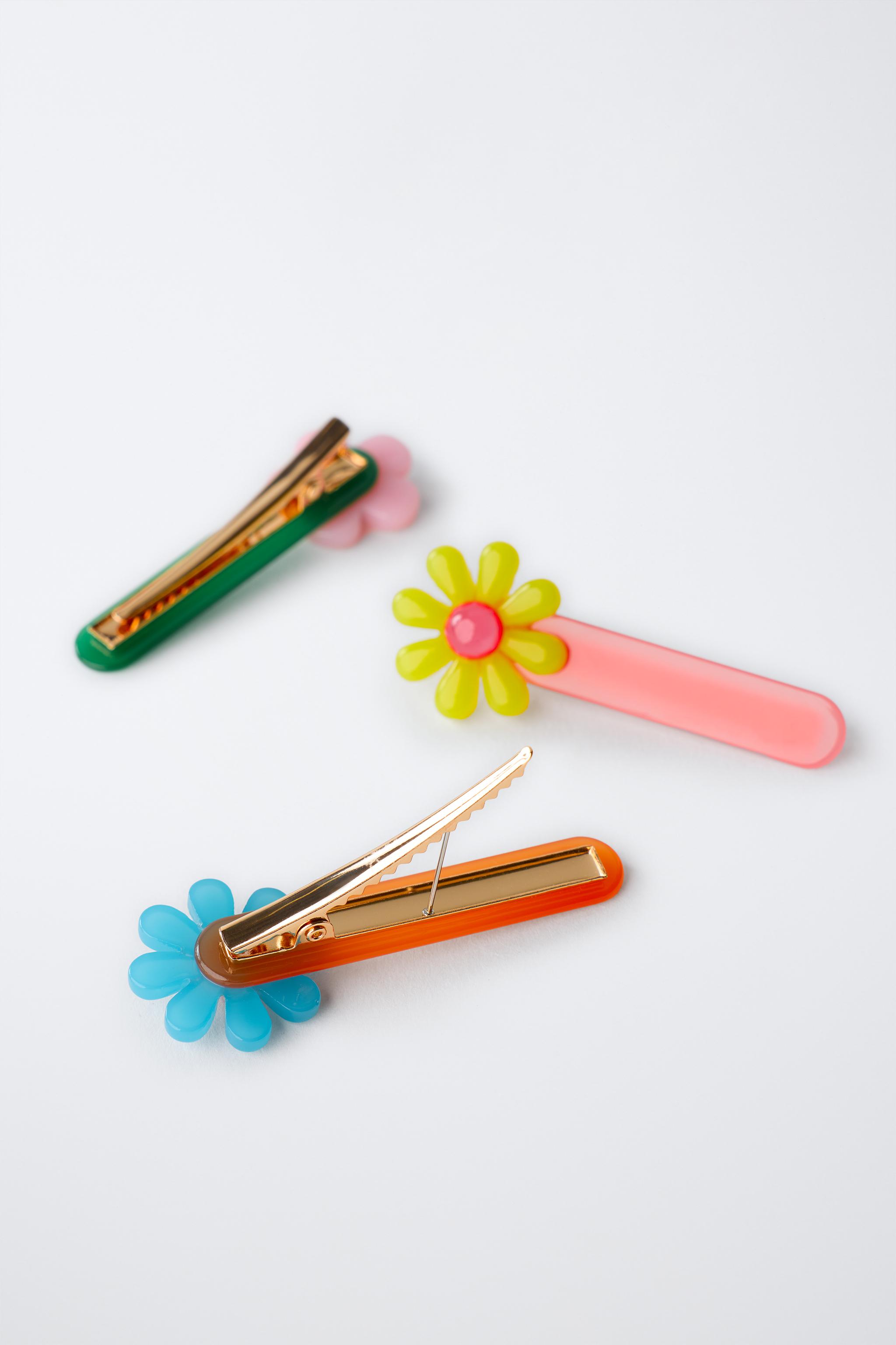 PACK OF THREE FLORAL HAIR CLIPS