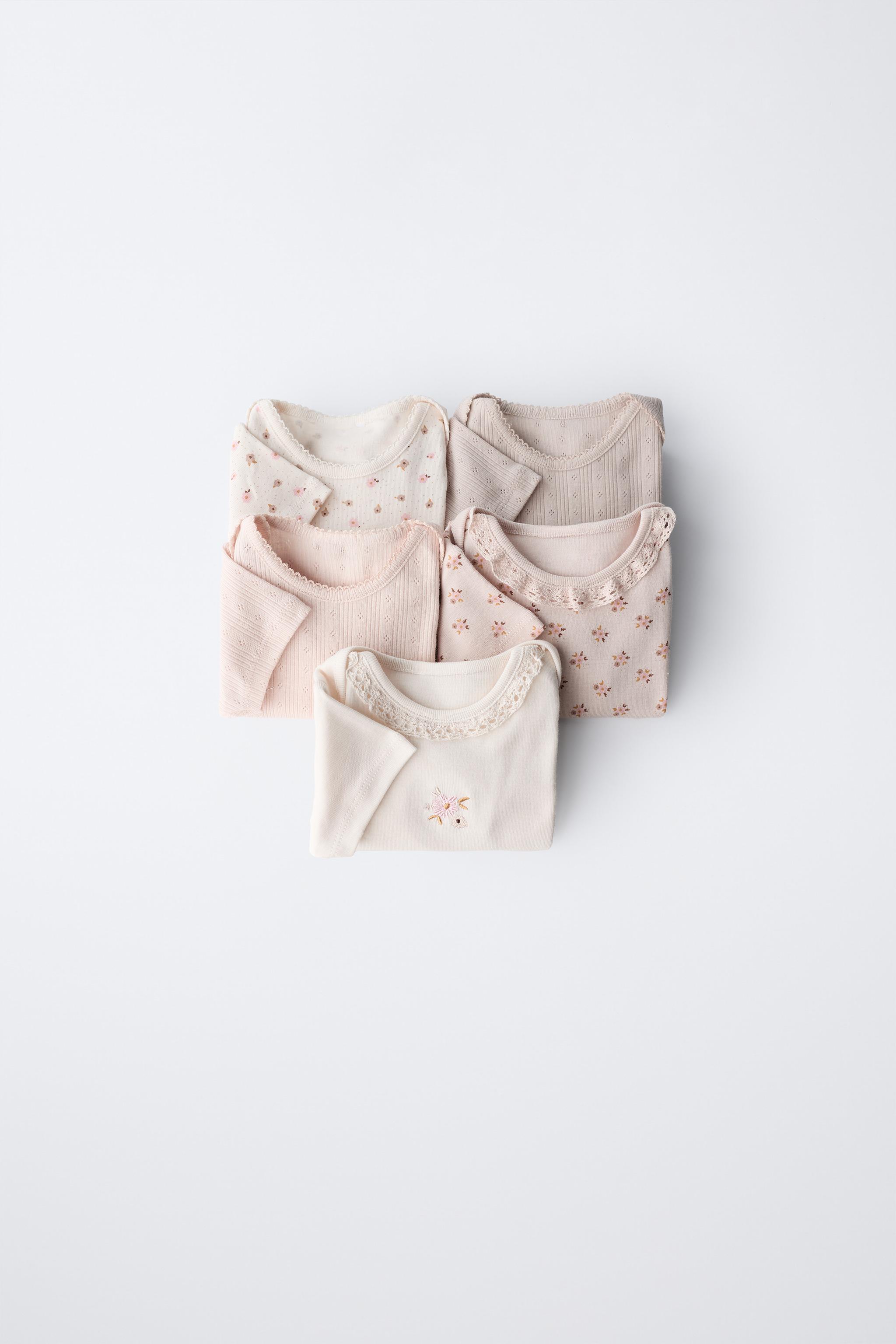 FIVE-PACK OF FLORAL BODYSUITS