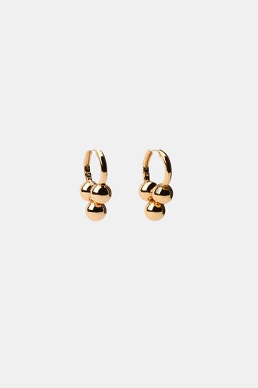 BOUCLES D'OREILLES CRÉOLES À BOULES - Doré de Zara - Image 1