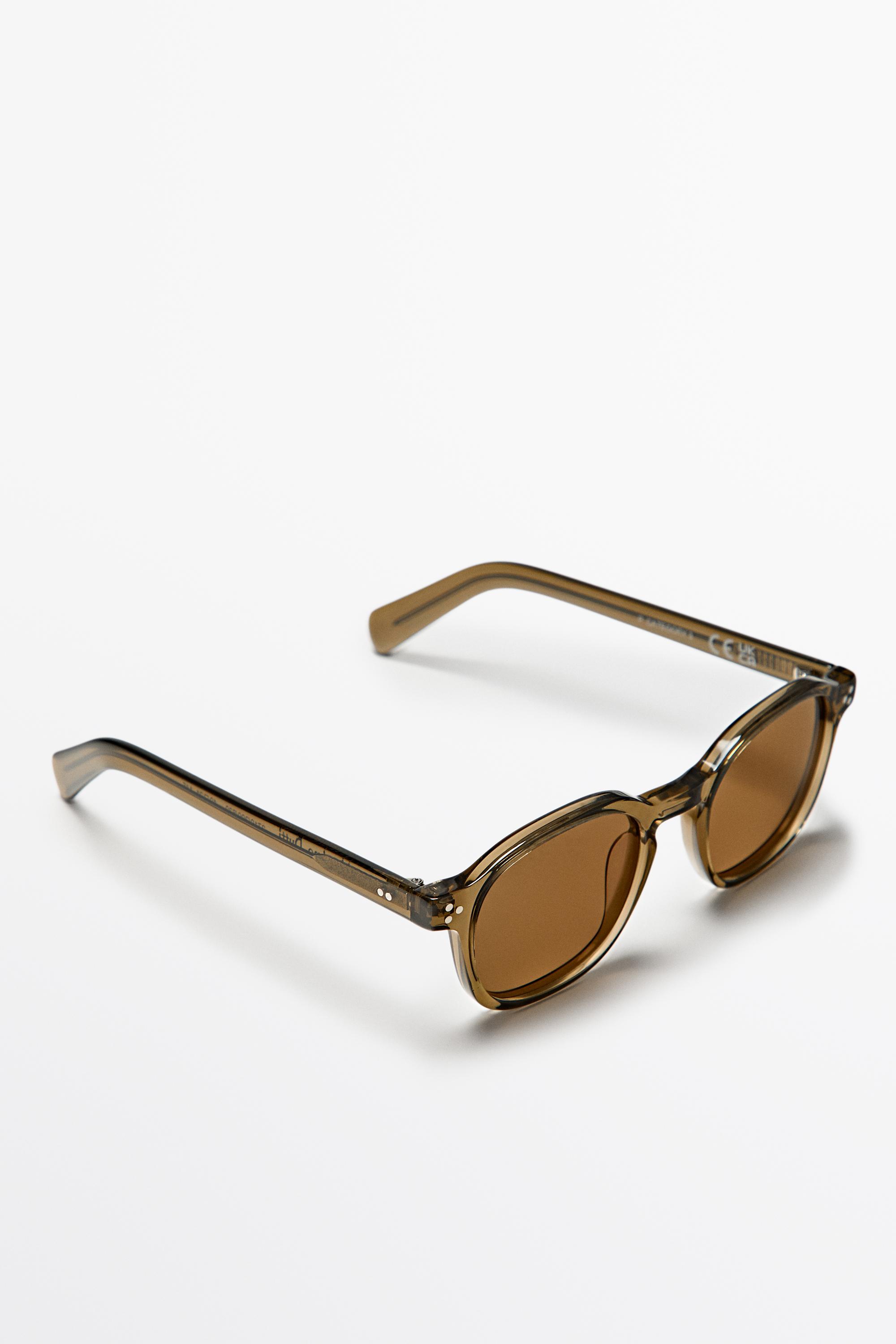 Round sunglasses — Black gold