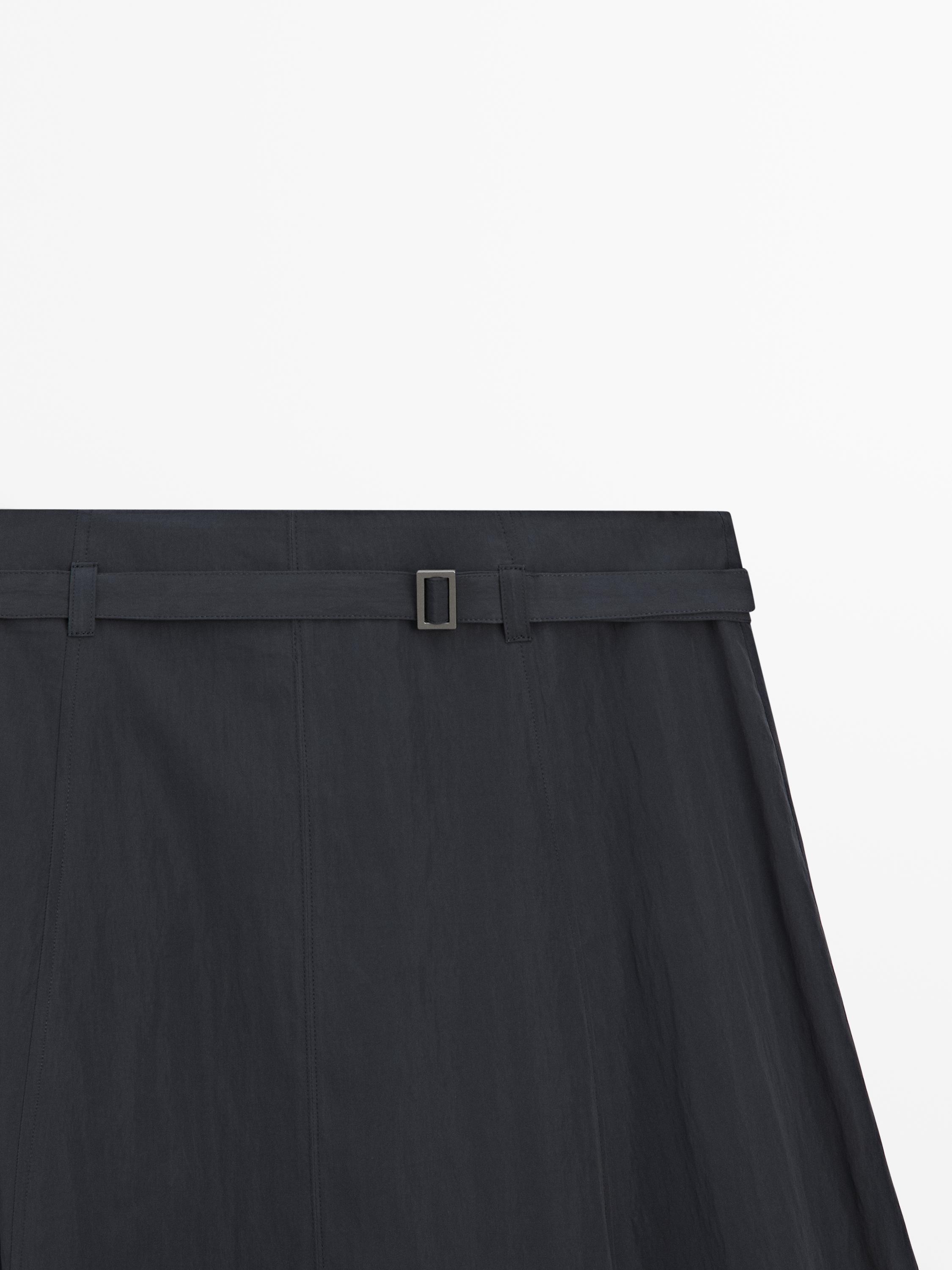 Long skirt with belt detail
