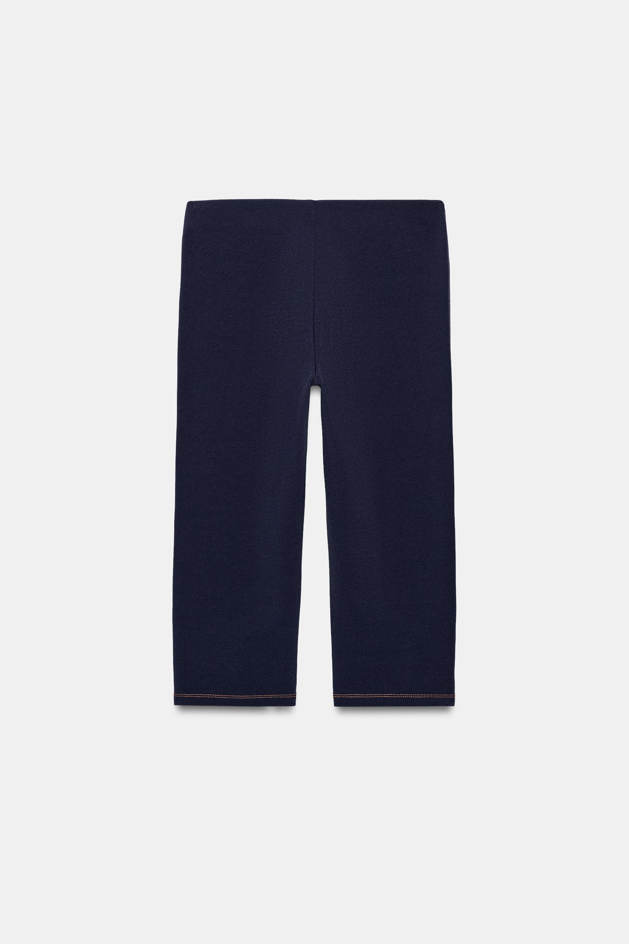 PANTALON CAPRI À SURPIQÛRES EN CONTRASTE