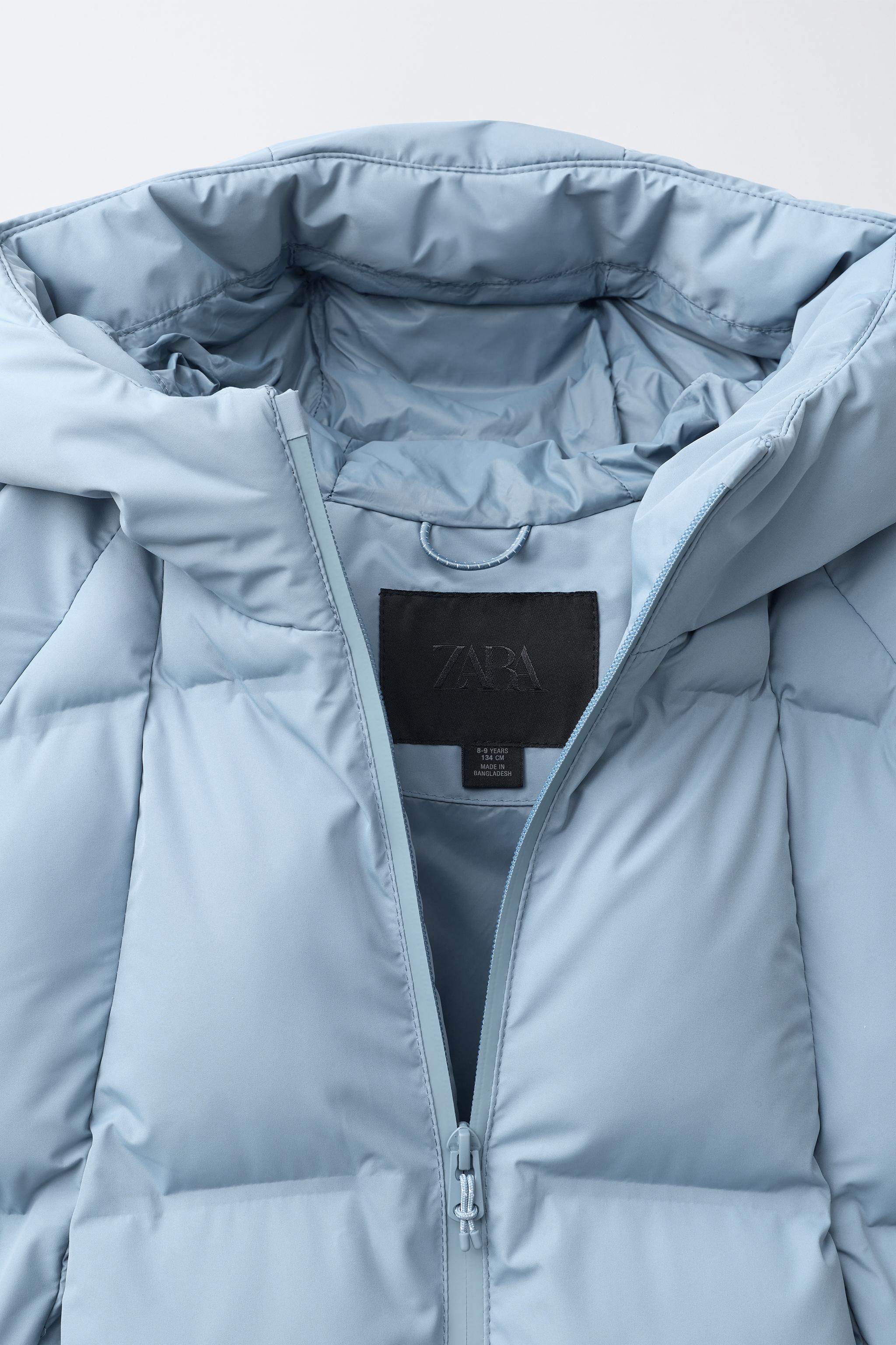 BLOUSON REMBOURRÉ À CAPUCHE DÉPERLANT