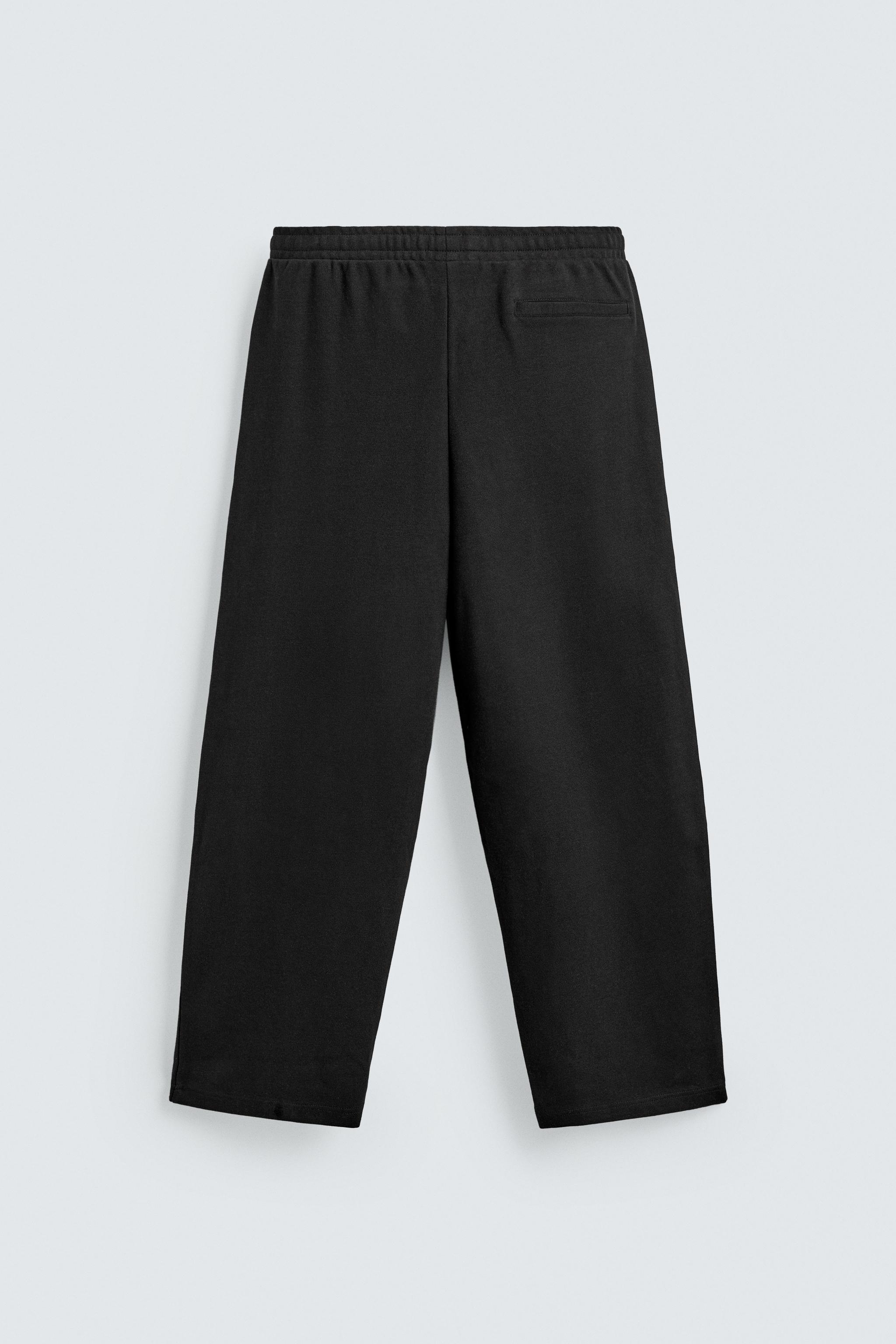 PLEATED WIDE FIT JOGGER PANTS