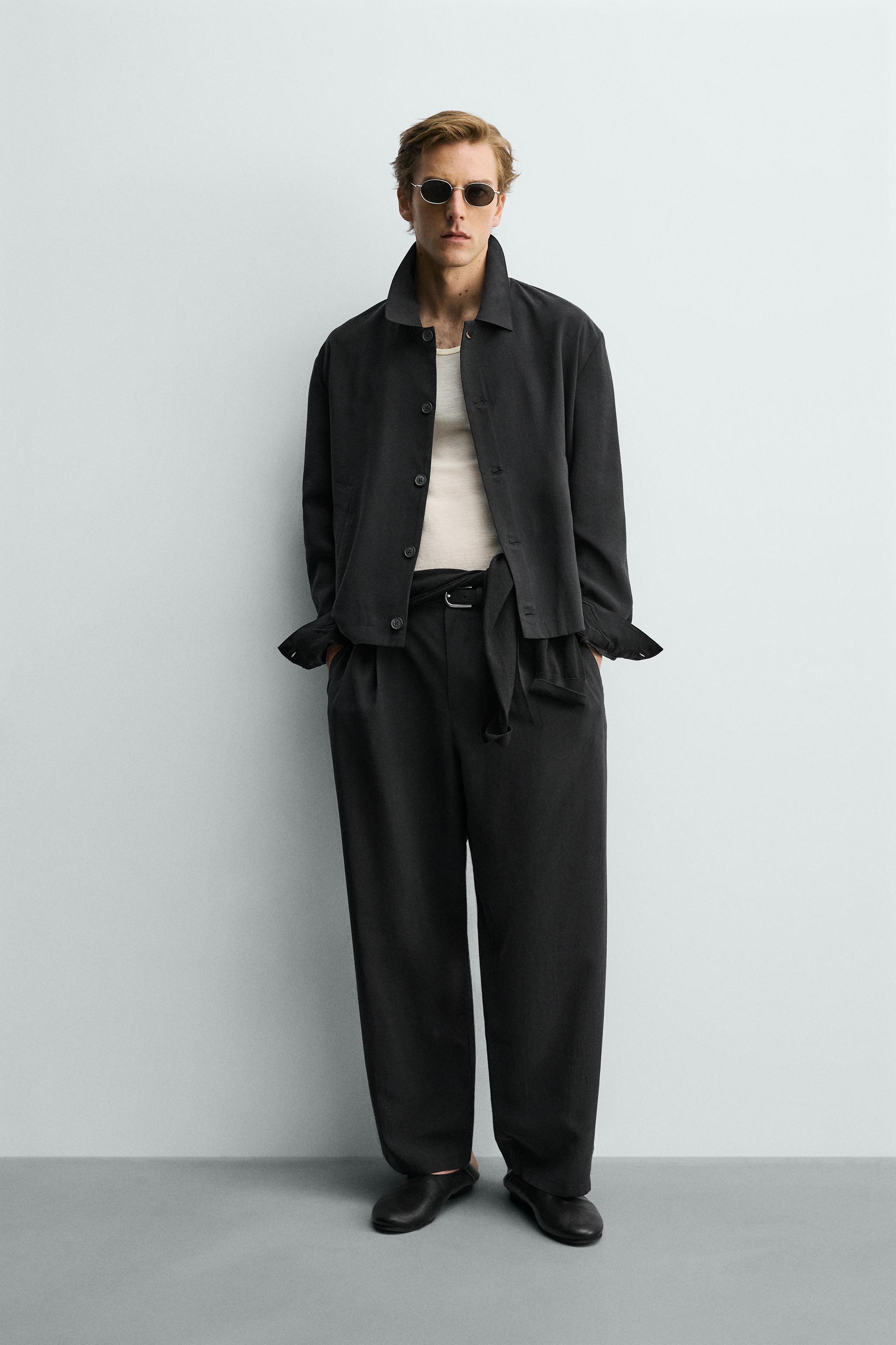 FLOWY PLEATED PANTS