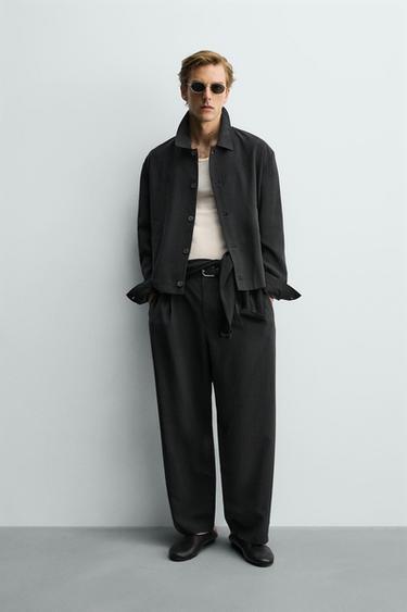 PANTALONS FLUIDS AMB PLECS - Negre de Zara