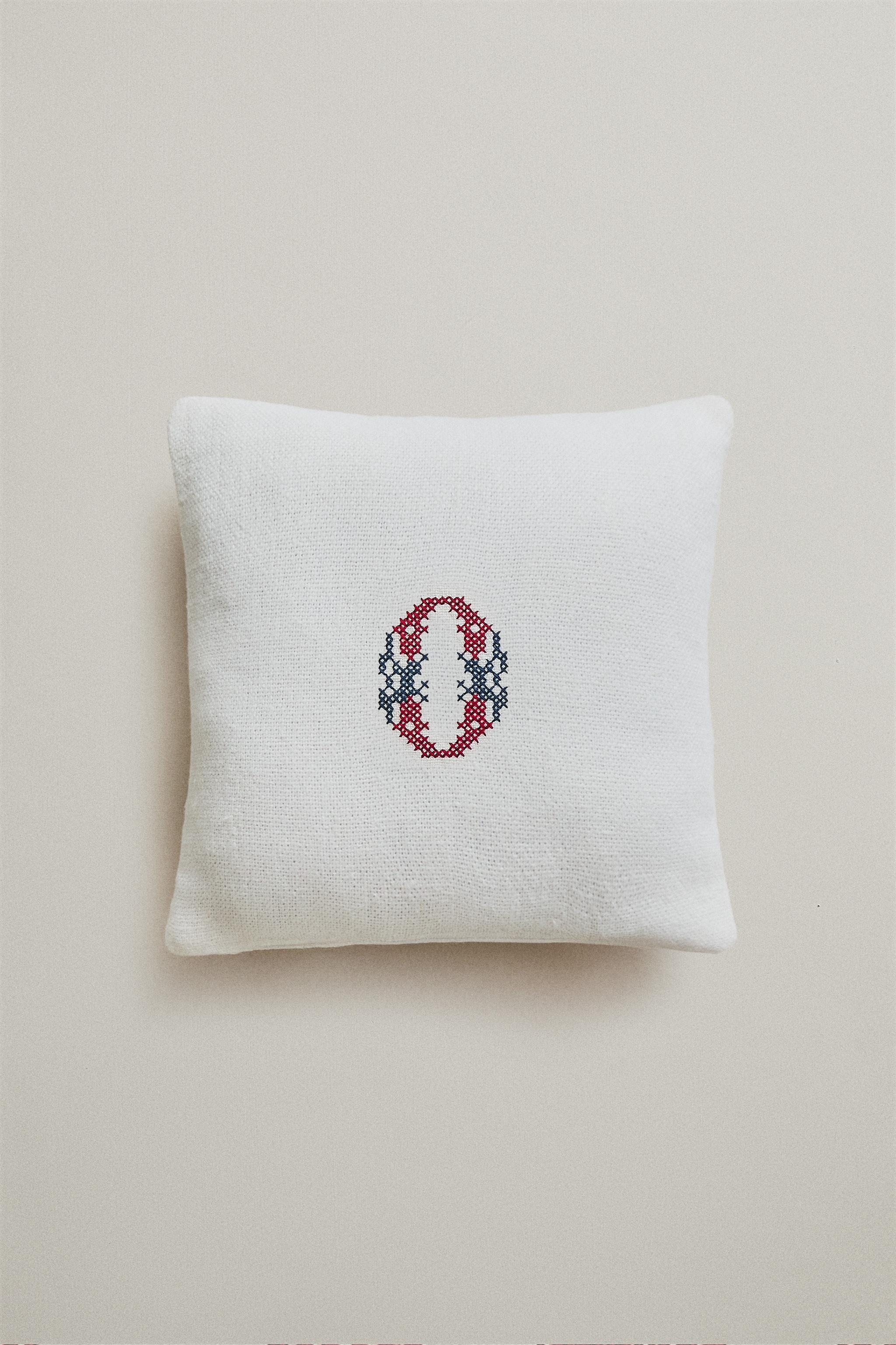 LINEN CUSHION WITH EMBROIDERED LETTER O
