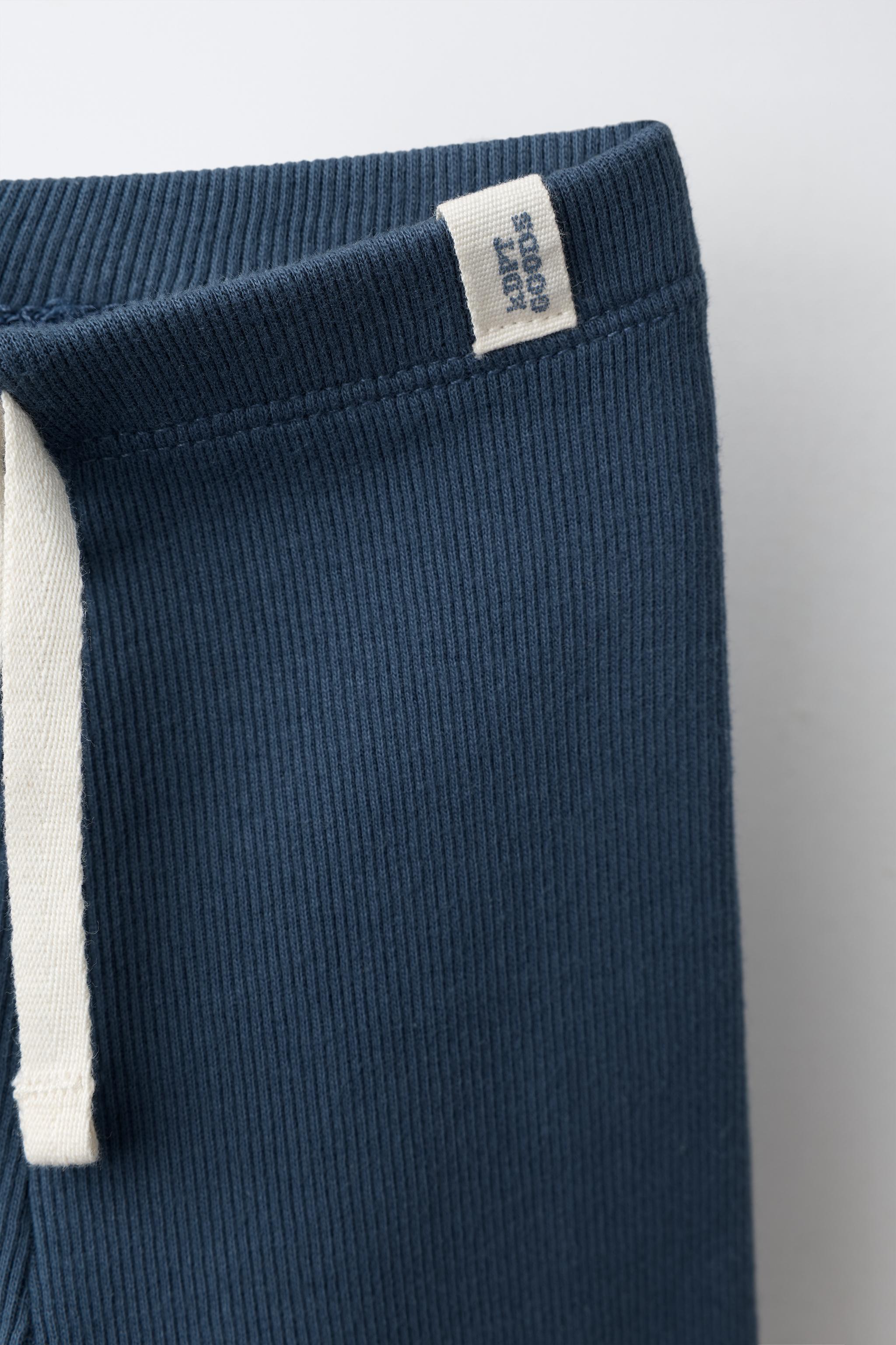 LABEL DETAIL RIBBED LEGGINGS