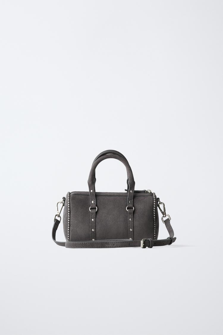 BOLSA CRUZADA CON TACHAS 5