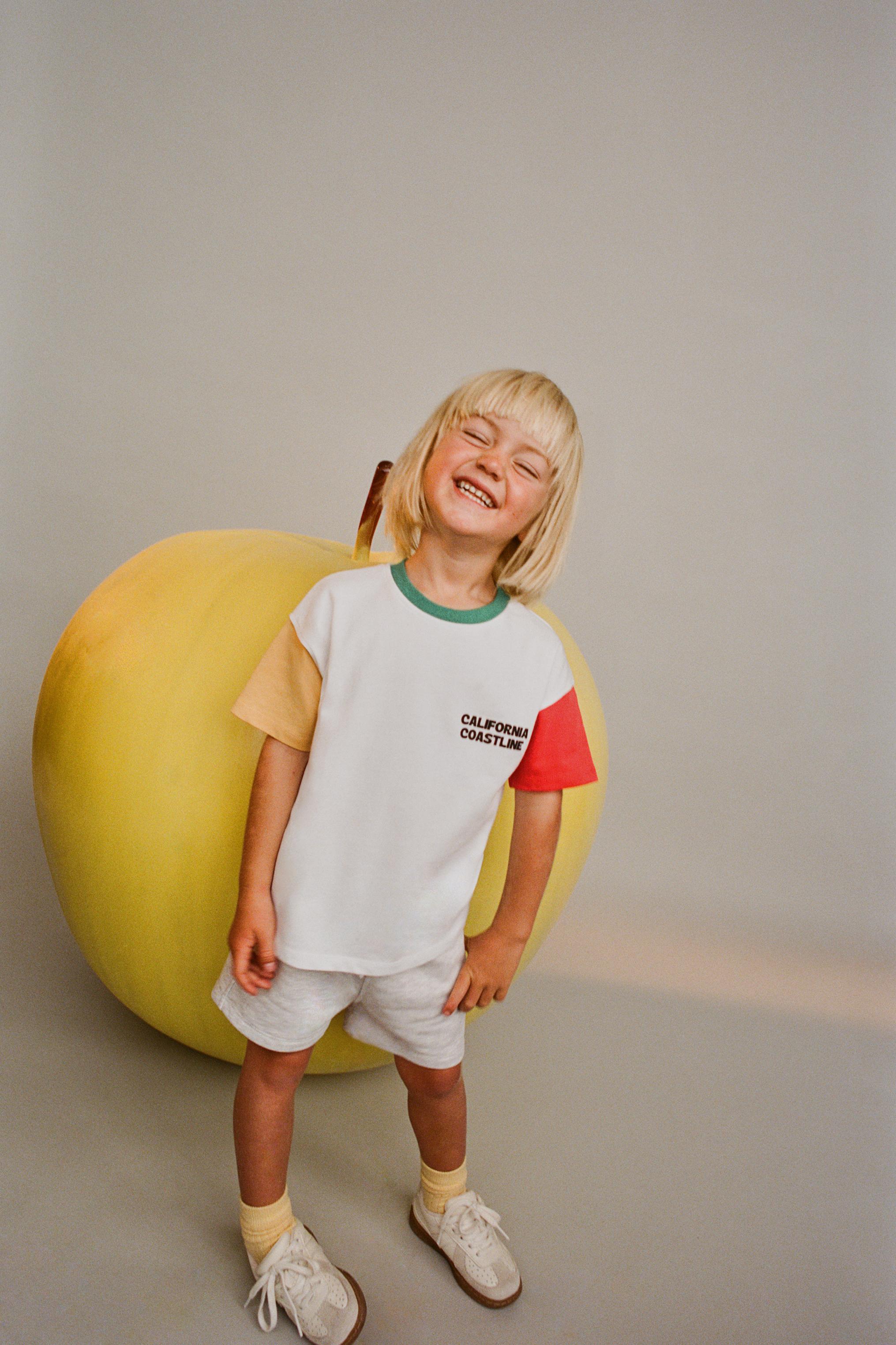 ENSEMBLE DE JOGGING T-SHIRT À INSCRIPTION ET BERMUDA CHINÉ