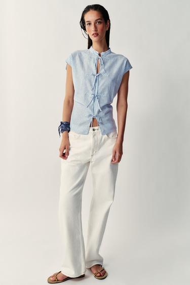 Blusa a rayas con hilo metálico y lazos