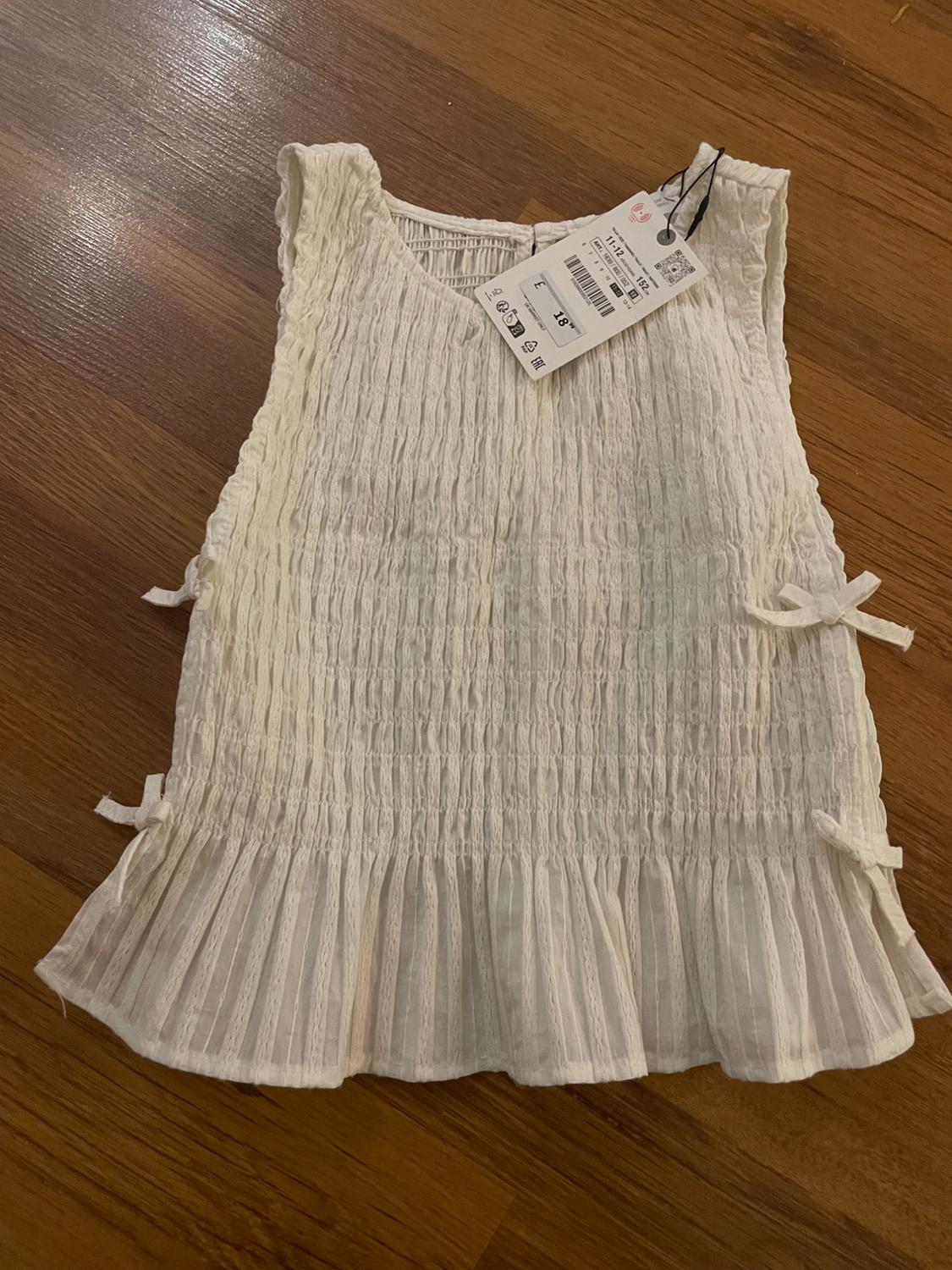 TOP WITH ELASTICATED DETAIL AND BOWS - Image 2