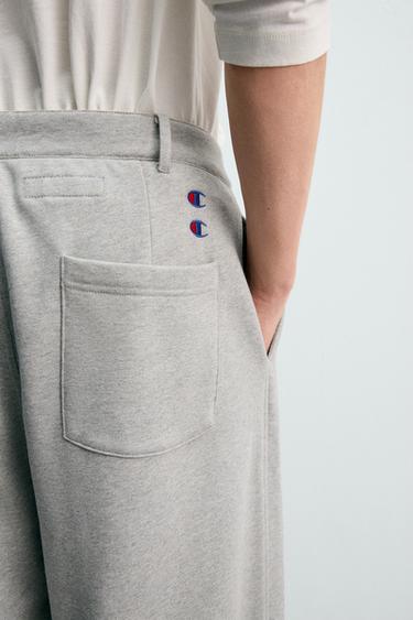 PANTALON COUPE DÉCONTRACTÉE PLIS CHAMPION ® X ZARA - Gris chiné de Zara - Image 4