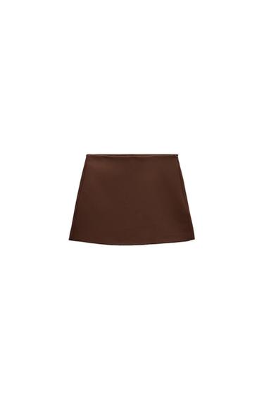 Front view of a short, straight-cut brown skirt.