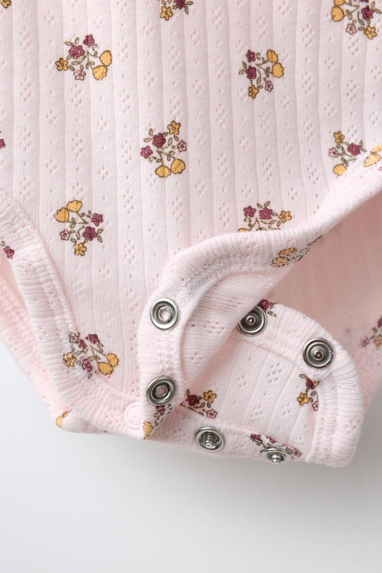 Conjunto de chaqueta, body y leggins de estampado floral 7