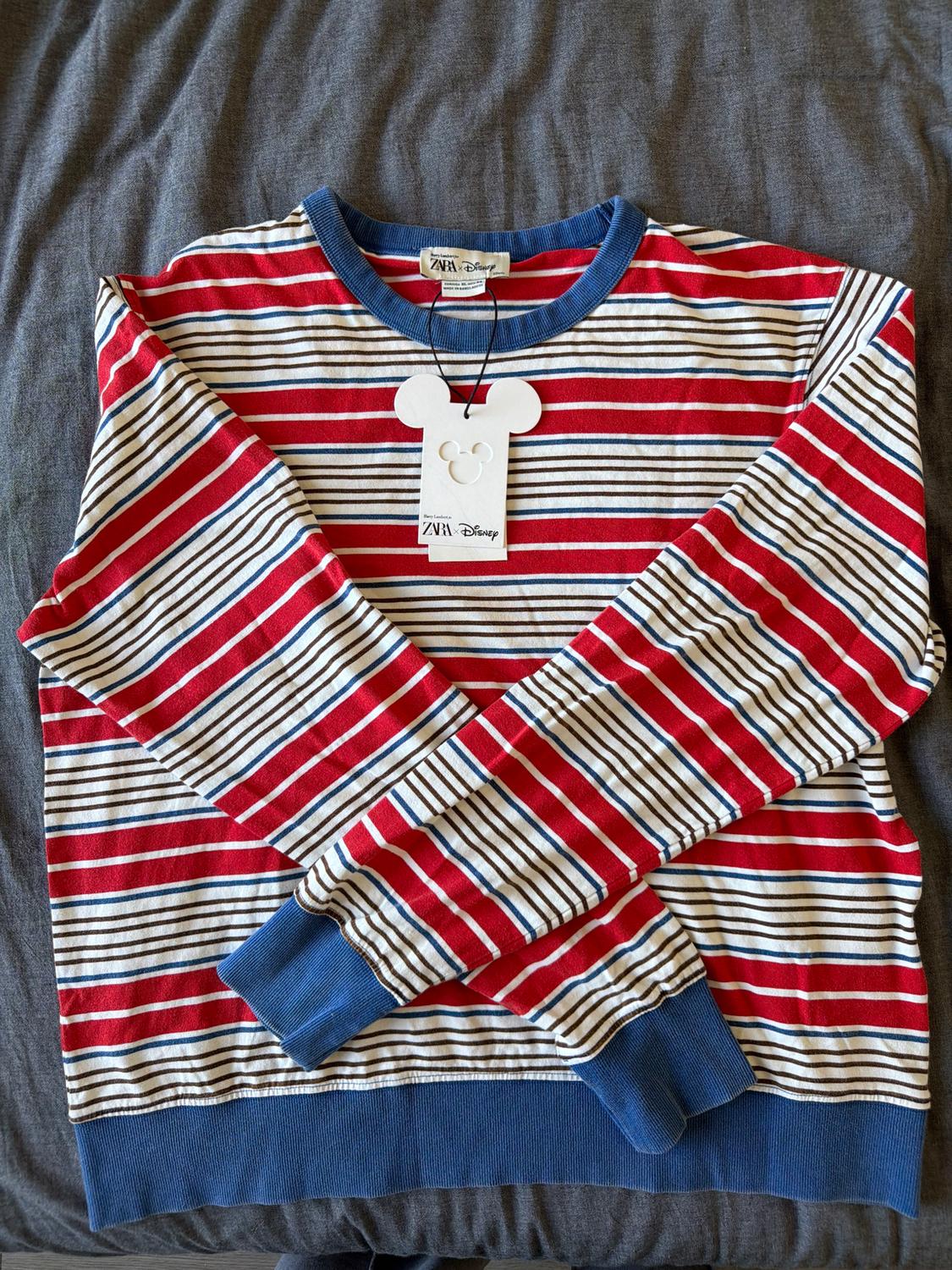 Red, white, and blue striped jumper with blue collar and cuffs. Zara x Disney Mickey Mouse-shaped label.