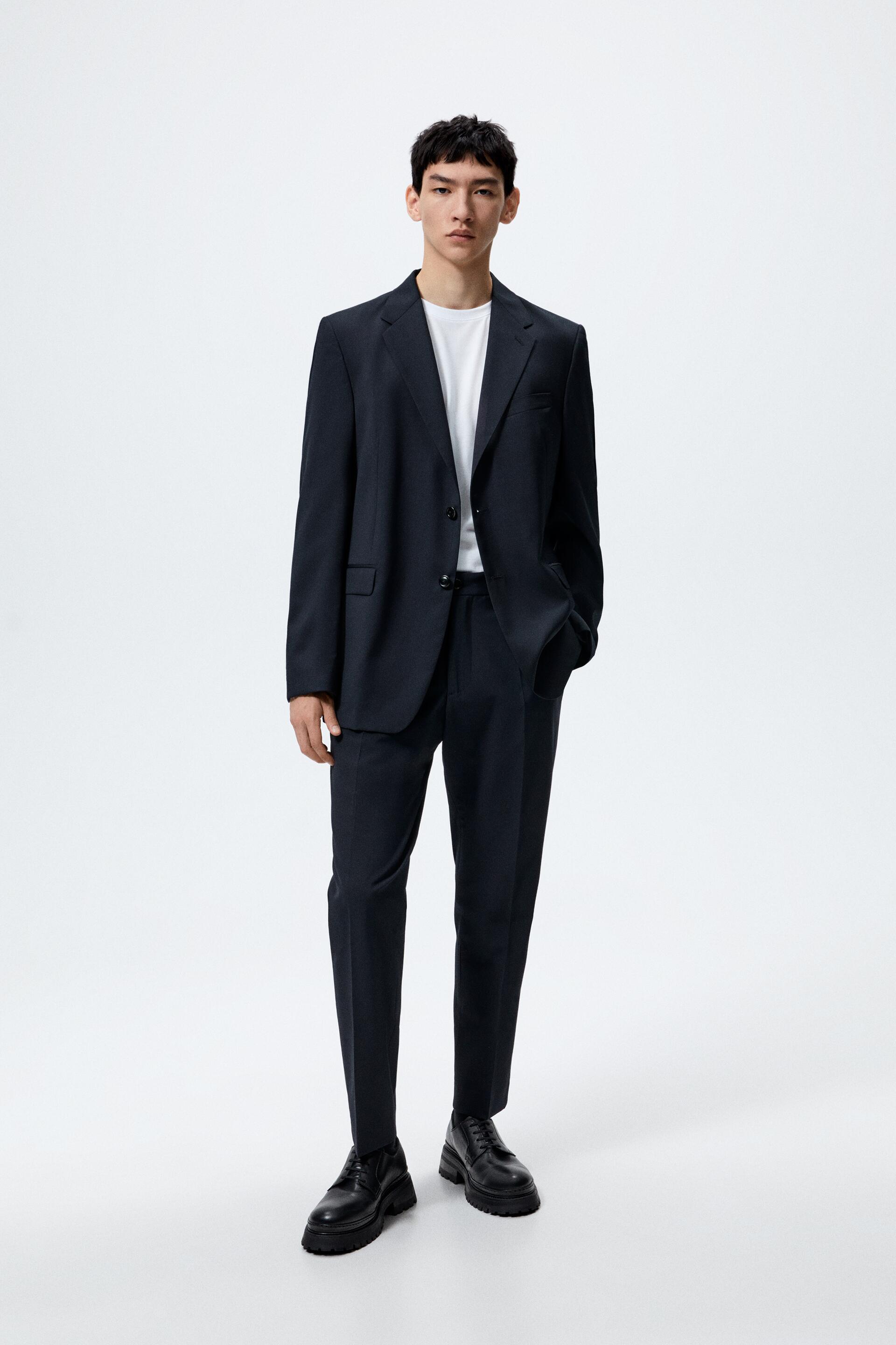 Zara store navy trousers