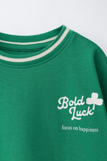 T-SHIRT À INSCRIPTION ET TRÈFLE - Vert clair de Zara - Image 2