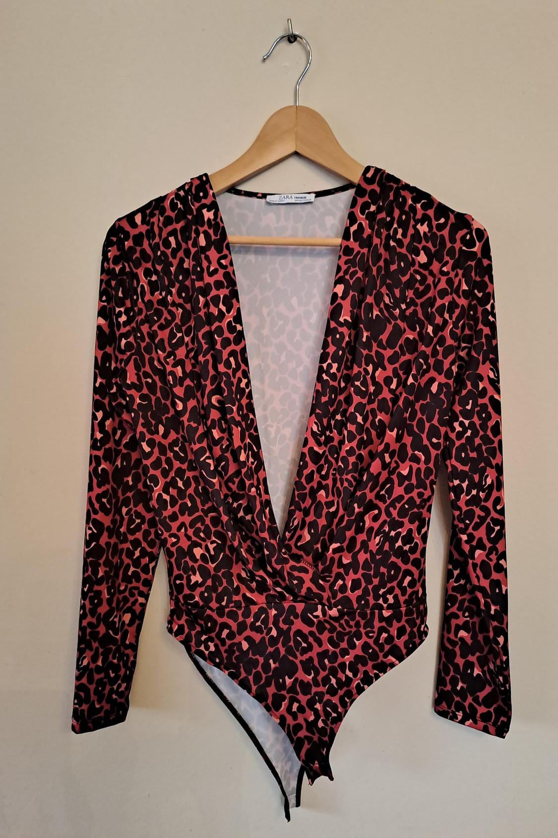 CROSSOVER BODYSUIT