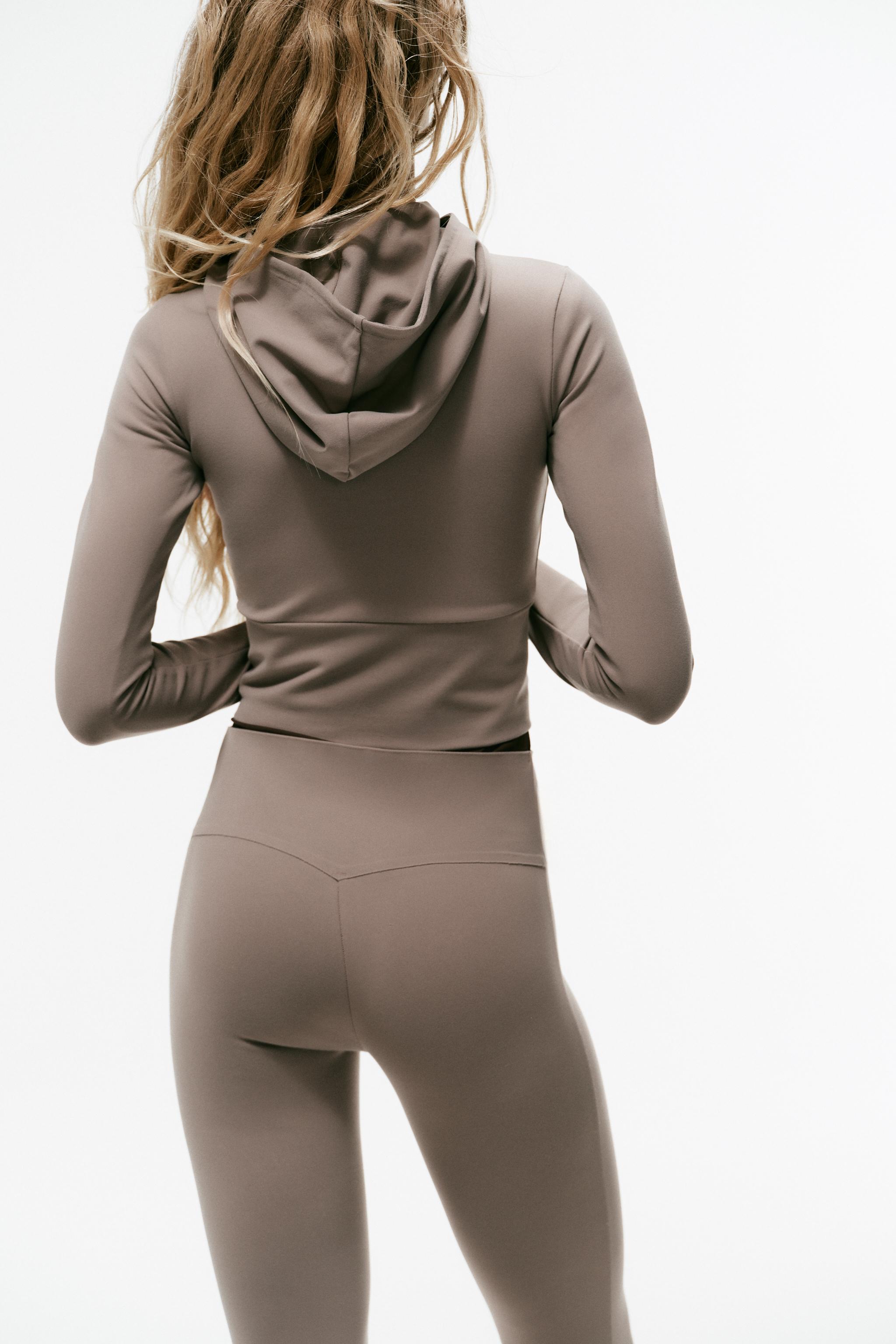 VESTE STRETCH CAPUCHE ZIP