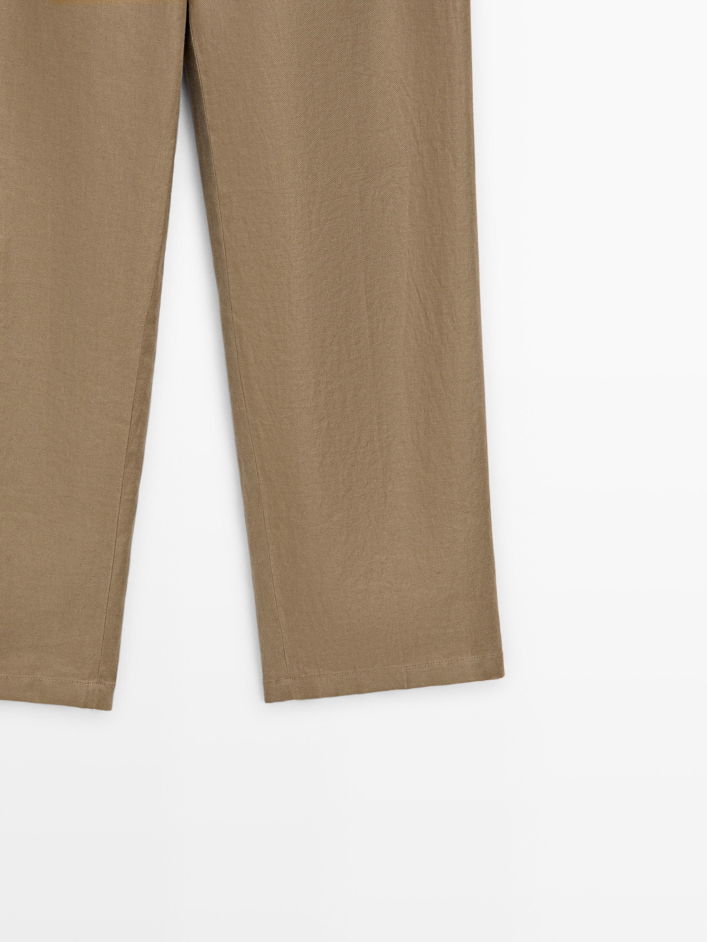 100% linen wide-leg elasticated trousers