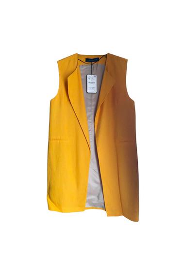 Front view of a sleeveless yellow waistcoat with side pockets.