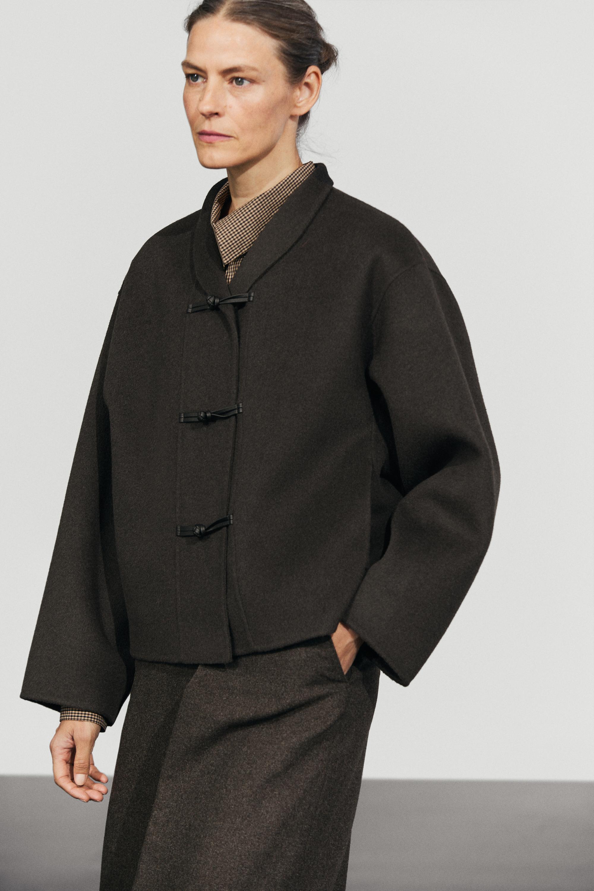 Short wool blend coat with button details
