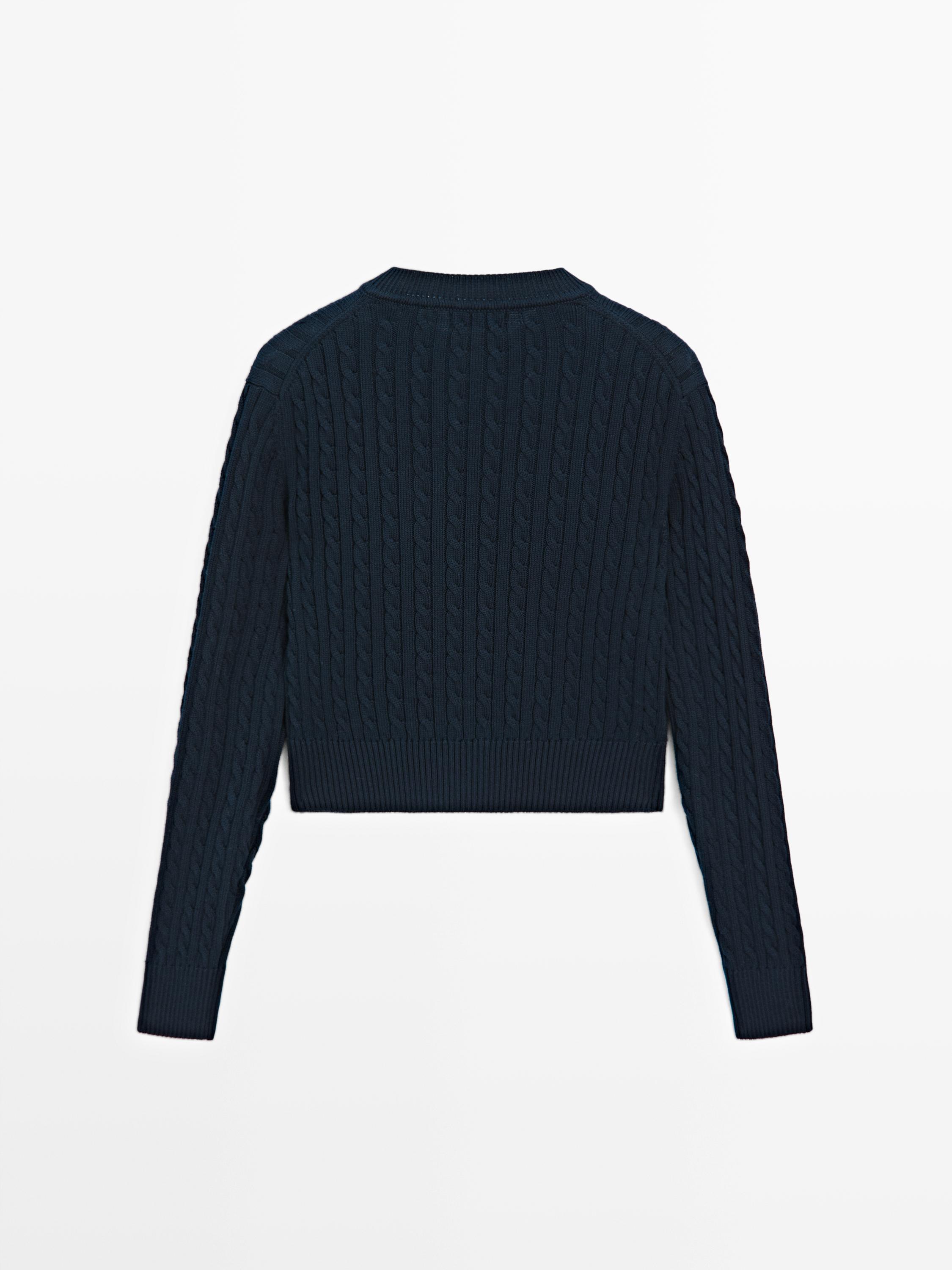 Cardigan tressé avec boutons dorés