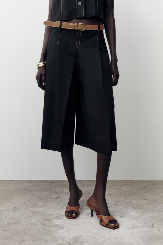 BELTED LONG PLEATED SHORTS