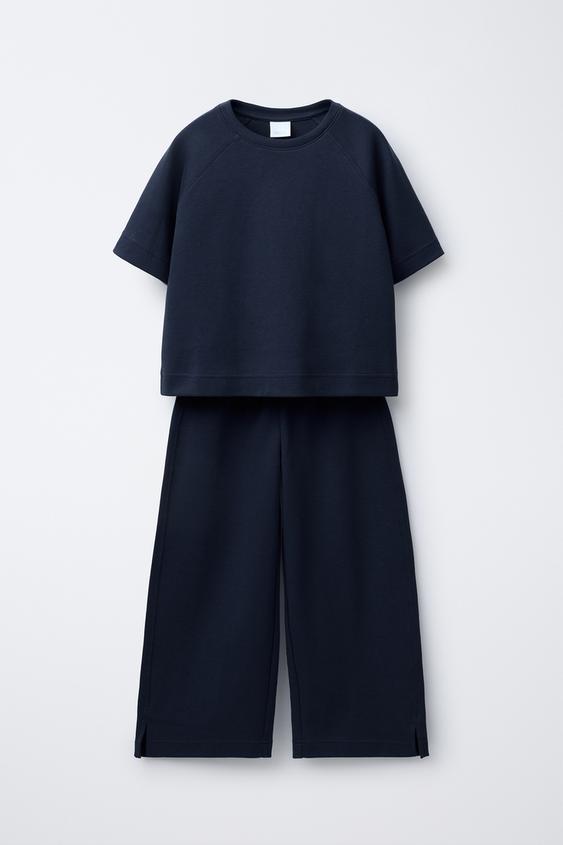 TOTAL LOOK BASIC RAGLAN SLEEVE T-SHIRT AND WIDE LEG INTERLOCK PANTS ...