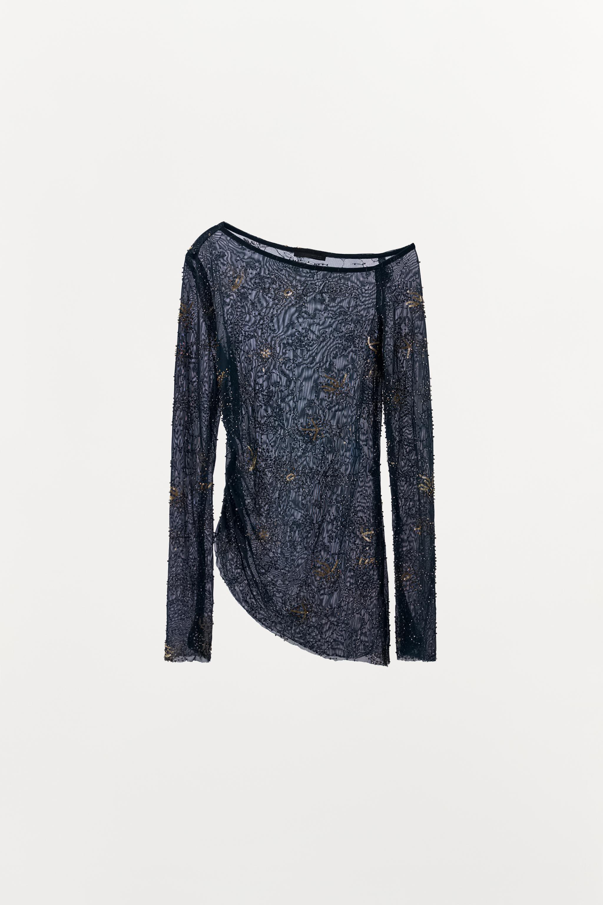 TOP EN TUL DRAPÉ BRODÉ AVEC FANTAISIE