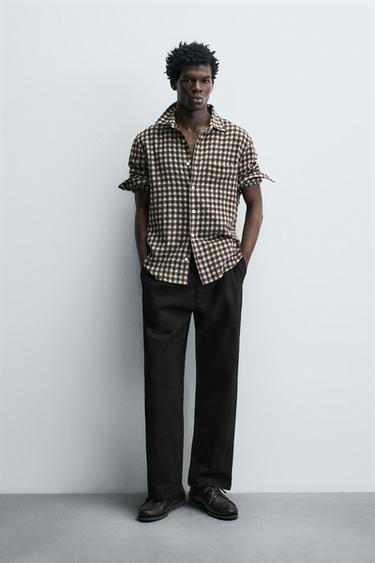 RELAXED FIT PLEATED TROUSERS - Black by Zara - Image 0