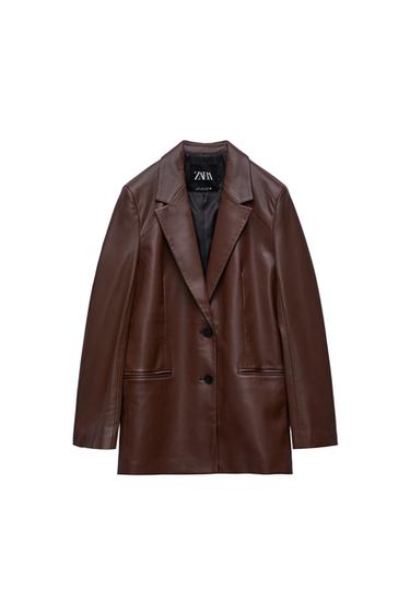 Blazer with lapel collar and long sleeves with shoulder pads. Front welt pockets. Back vent. Front button closure.