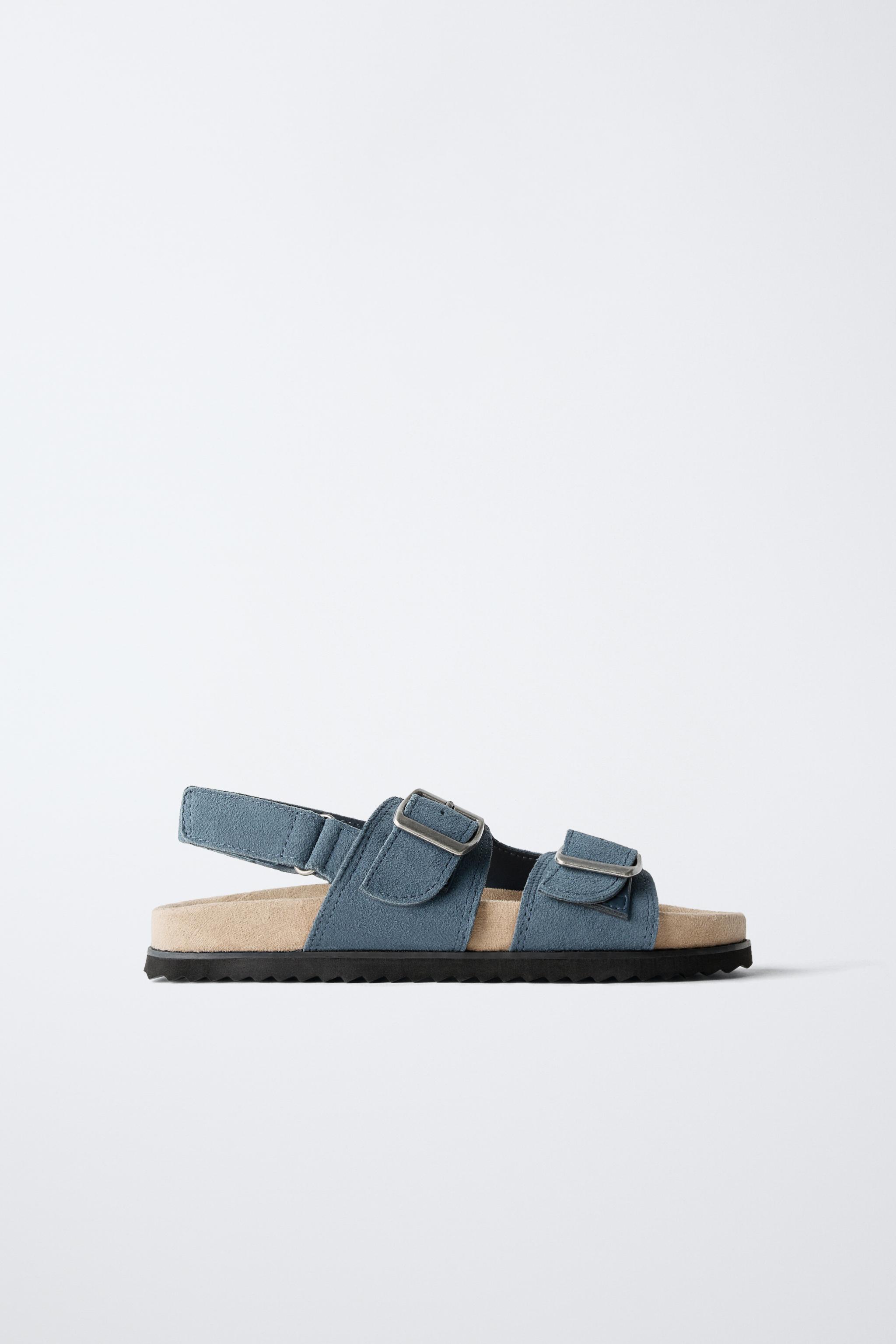 SANDALES EN CUIR À BOUCLES