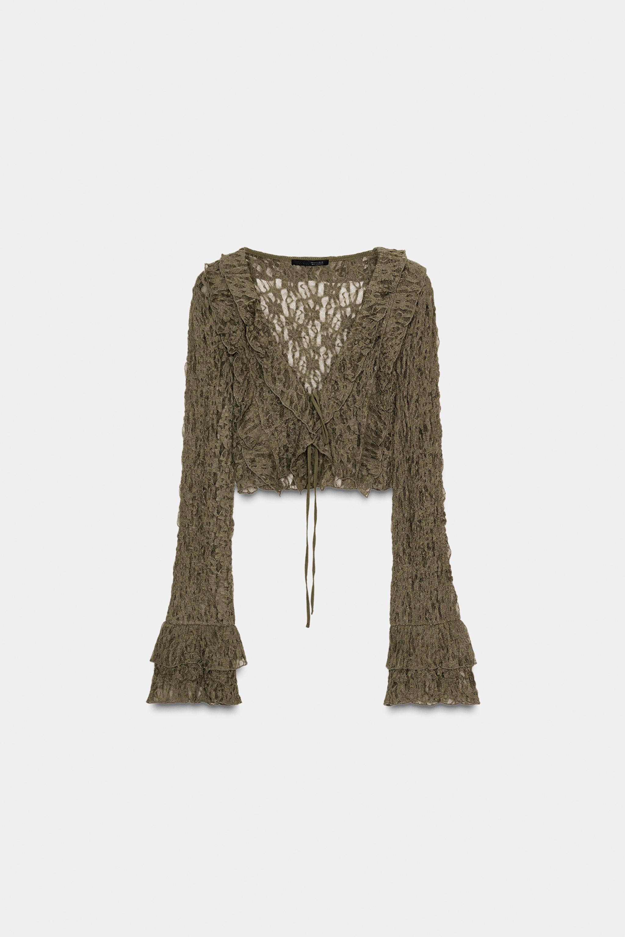 VESTE COURTE EN DENTELLE À VOLANTS