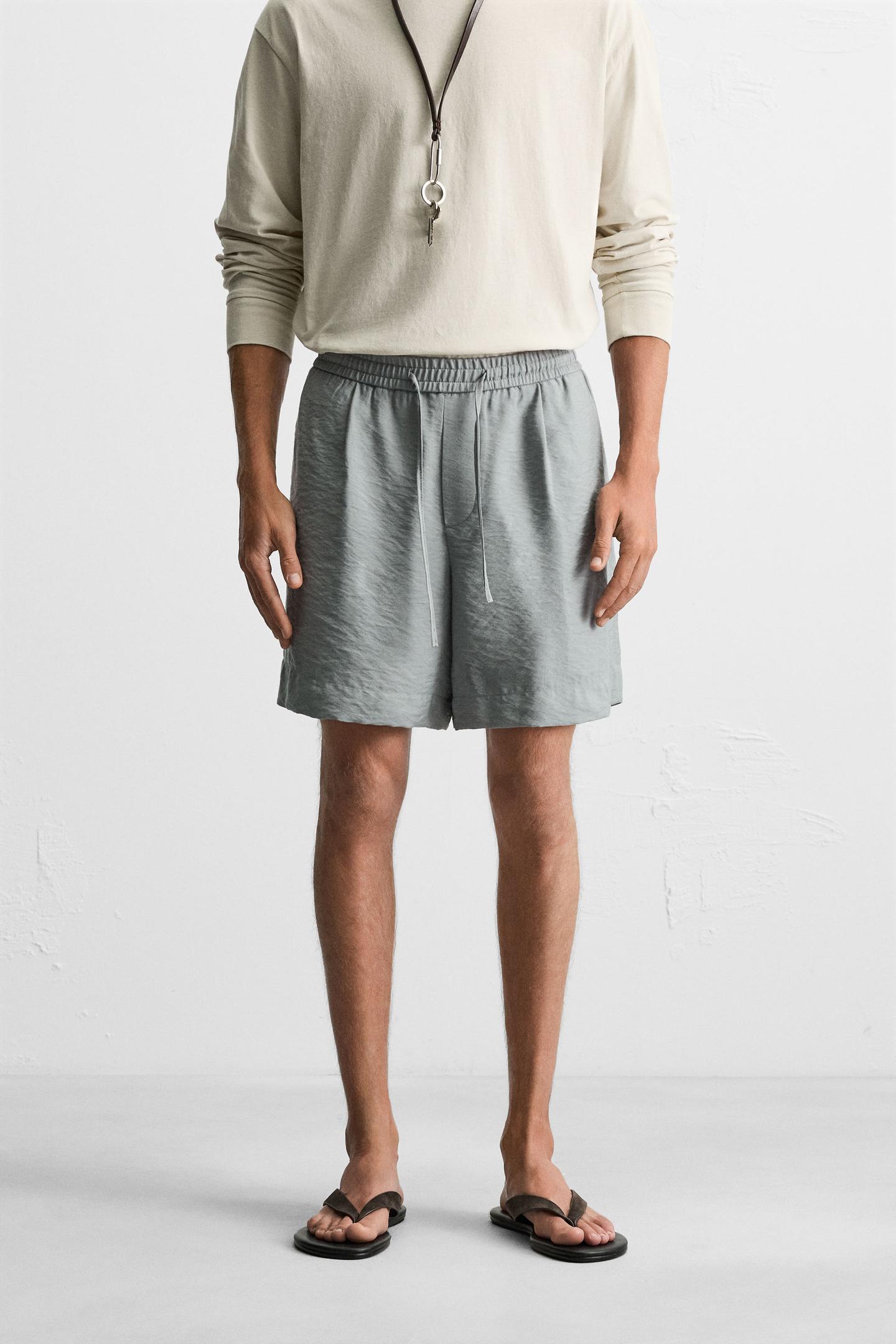 FLOWY RELAXED FIT BERMUDA SHORTS