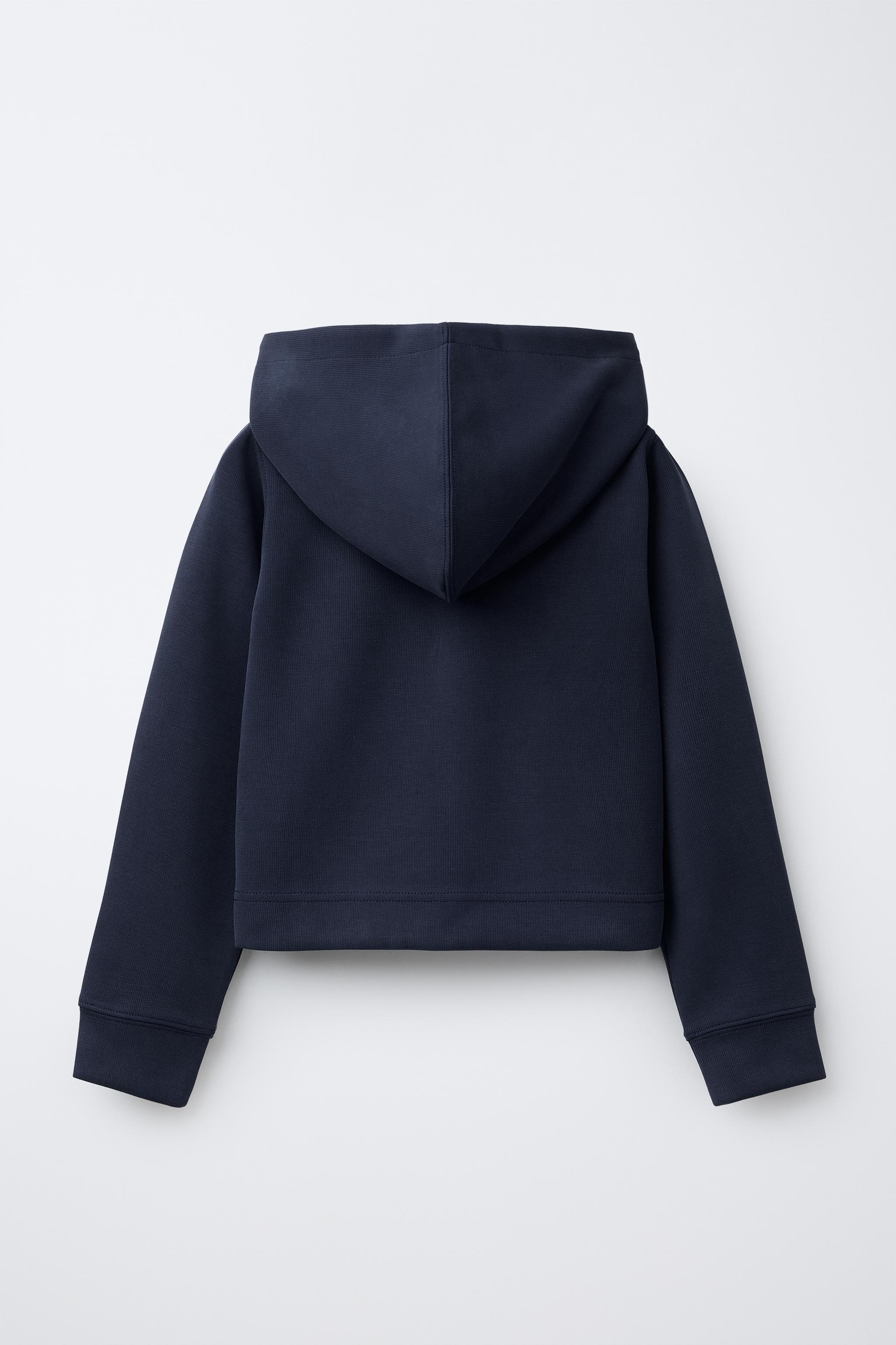 RAISED TEXT HOODED SWEATSHIRT