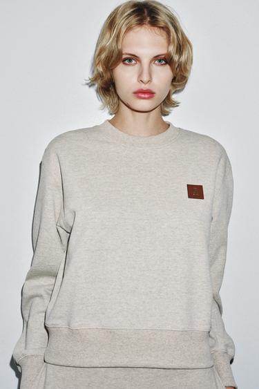 SWEATSHIRT WITH LABEL DETAIL ON THE FRONT - Beige by Zara - Image 0