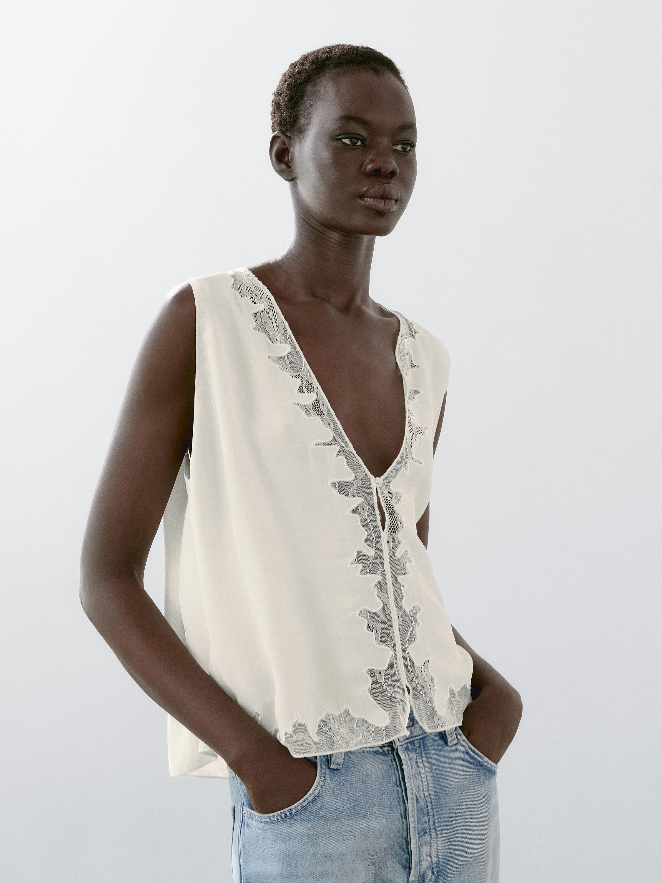 Blouse fluide à dentelle
