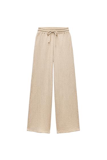 TEXTURED WIDE-LEG TROUSERS