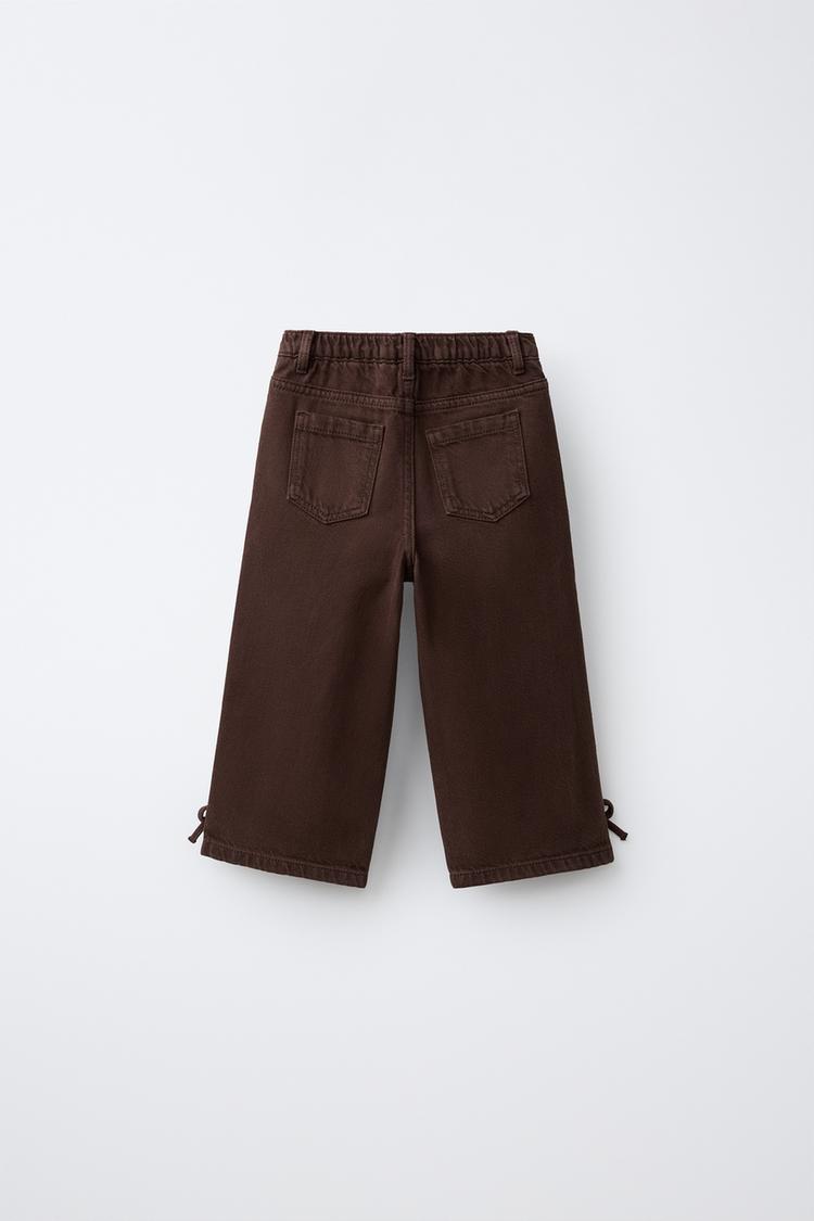 Jeans de pierna ancha con moño 2