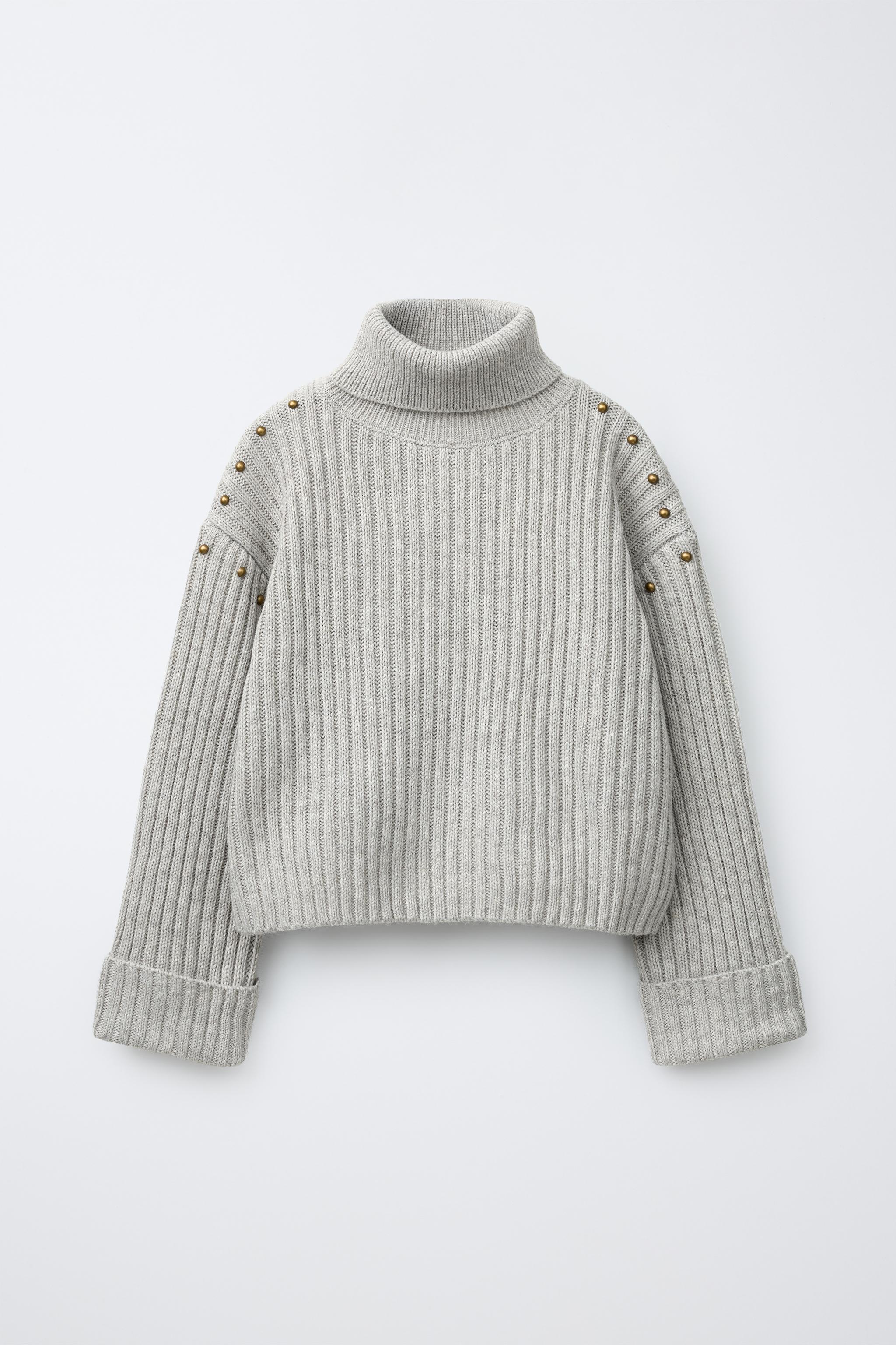 JERSEY PUNTO CUELLO VUELTO TACHAS CON LANA