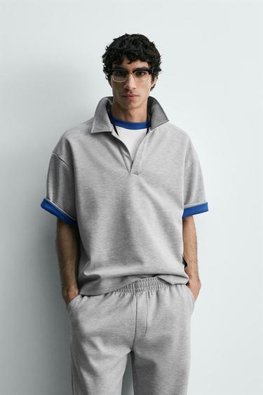 بولو بقصّة قصيرة مع بطاقة - رمادي فيجوريه الخاص بـ Zara